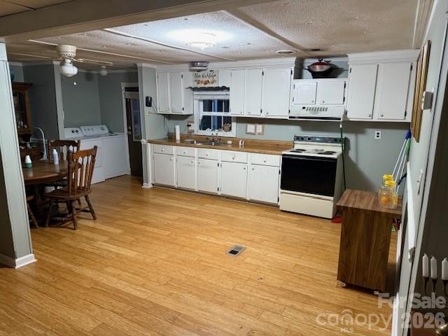 2056 Sipe Road Conover, NC 28613 - Photo 5 of 7 a kitchen with stainless steel appliances granite countertop a refrigerator and a stove top oven
