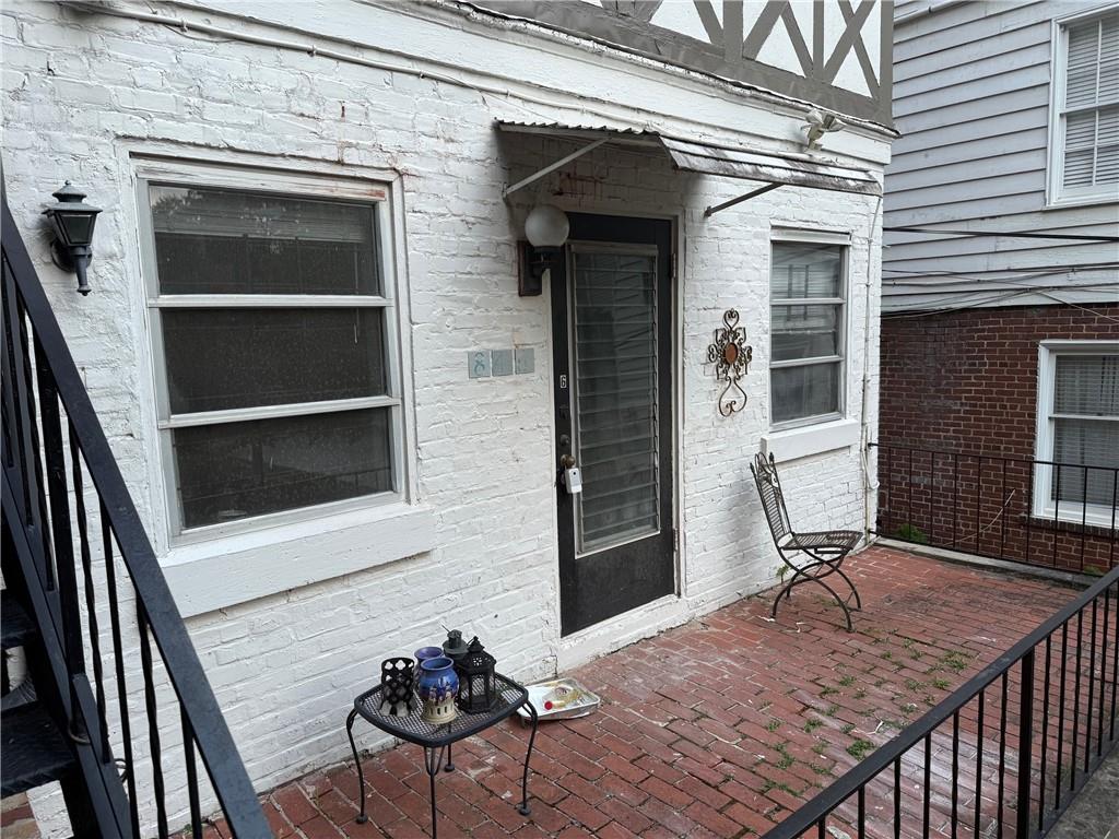 846 Briarcliff Road Northeast Atlanta, GA 30306 - Photo 16 of 22 a view of a house with a large window and wooden floor