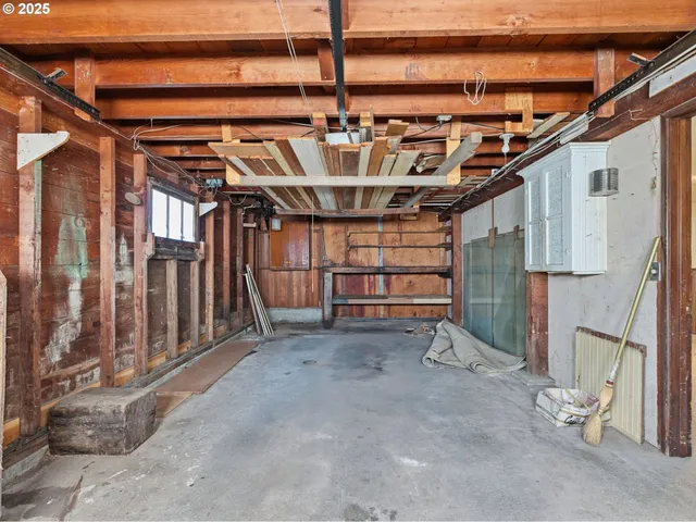 a view of a room with wooden walls