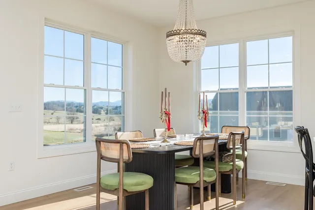 a bathroom with a sink a toilet and shower curtain