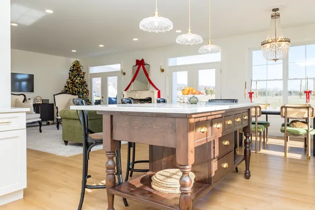 a view of an empty room with a large window