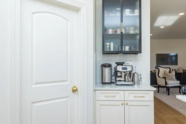a room with gym equipment and windows