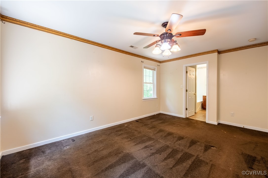 4558 Leakes Mill Road Gum Spring, VA 23065 - Photo 35 of 48 an empty room with windows and fan