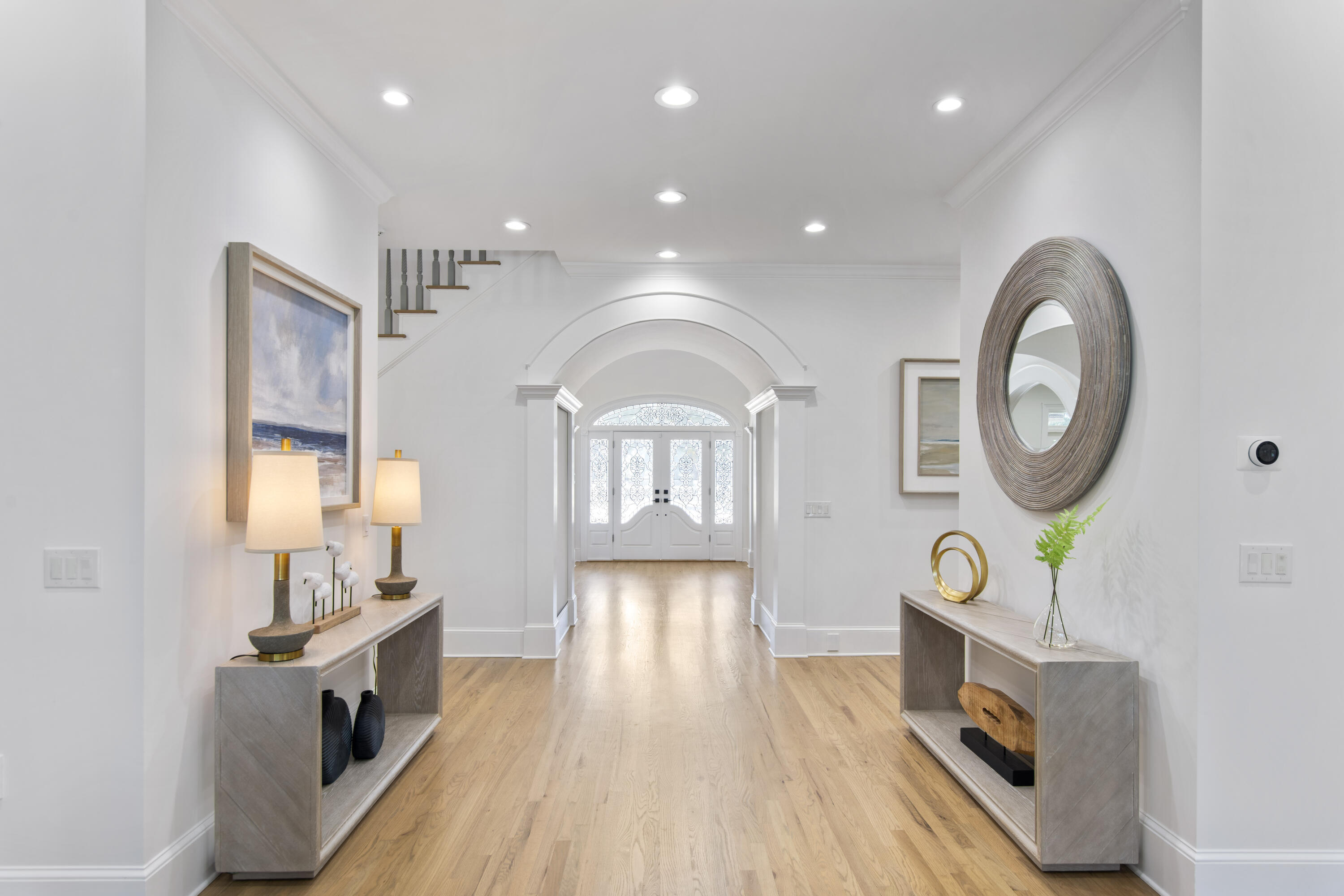 671 Driftwood Point Road Santa Rosa Beach, FL 32459 - Photo 16 of 41 a view of a living room a dining room wooden floor and a fireplace