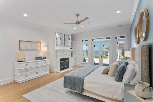 a bedroom with furniture and a fireplace