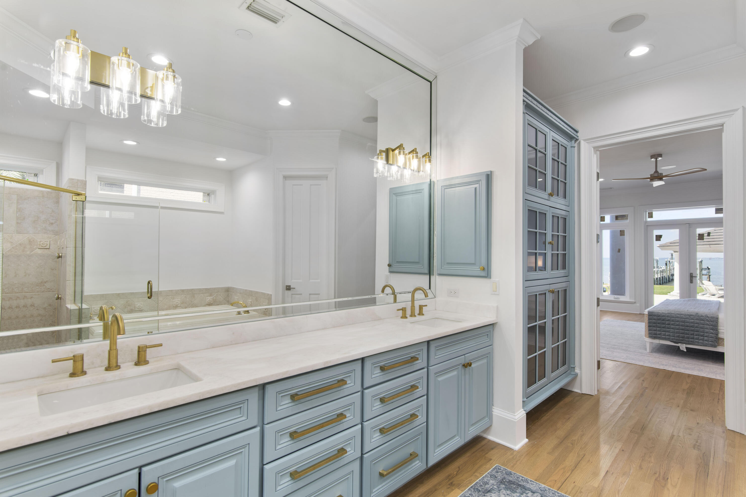 671 Driftwood Point Road Santa Rosa Beach, FL 32459 - Photo 24 of 41 a spacious bathroom with double vanity and a large mirror
