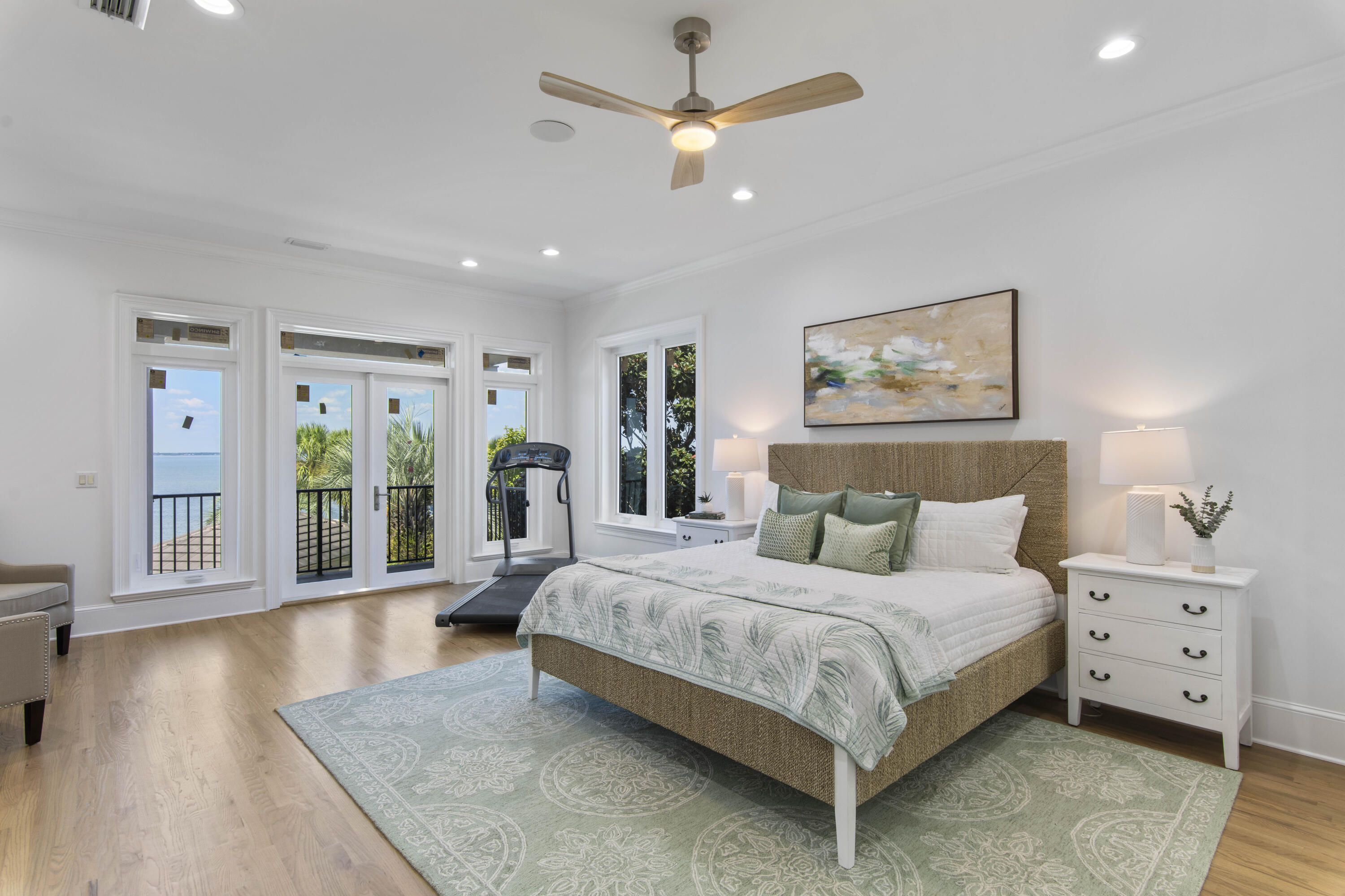 671 Driftwood Point Road Santa Rosa Beach, FL 32459 - Photo 26 of 41 a bedroom with a large bed and a chandelier