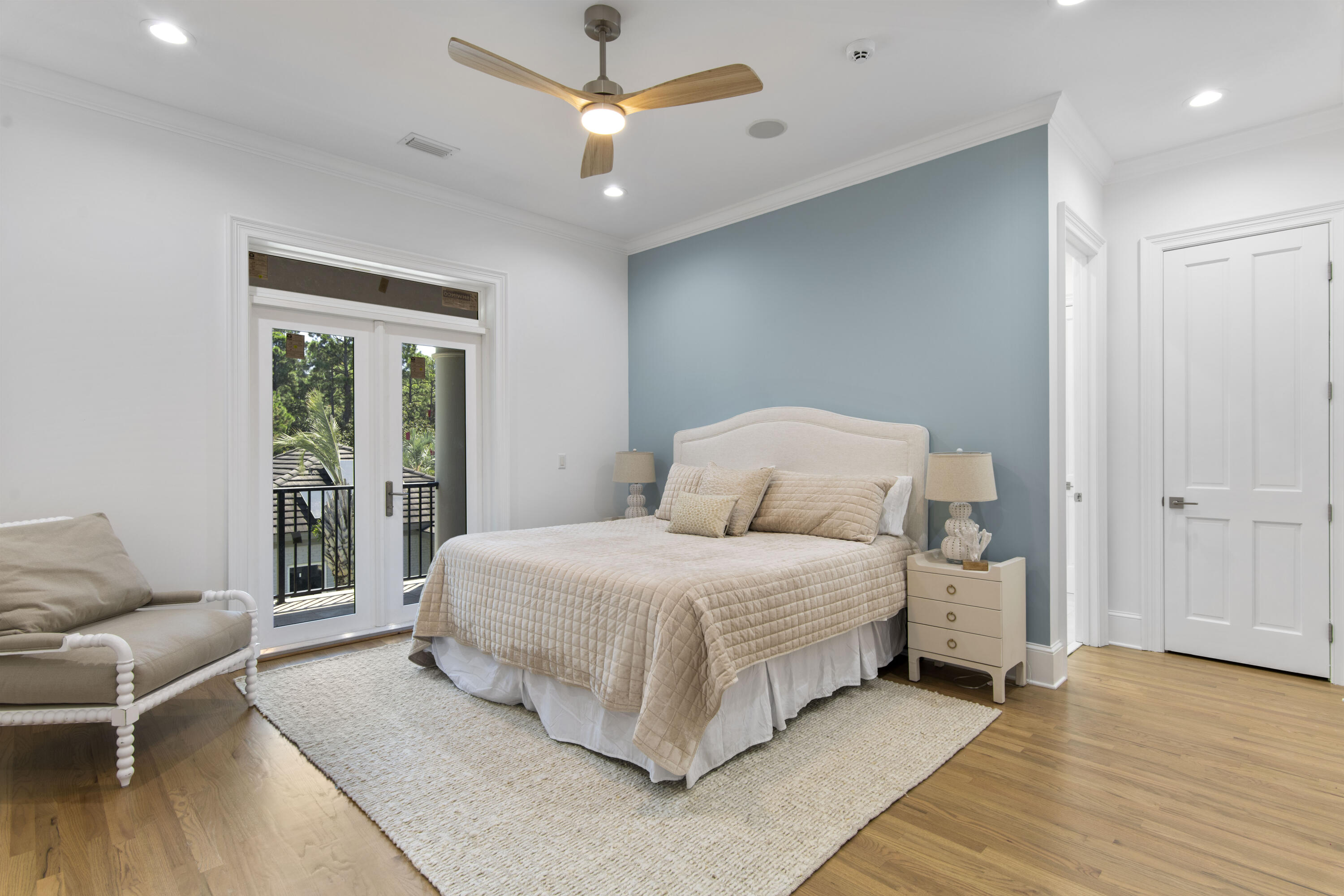 671 Driftwood Point Road Santa Rosa Beach, FL 32459 - Photo 29 of 41 a bedroom with a large bed and a chandelier