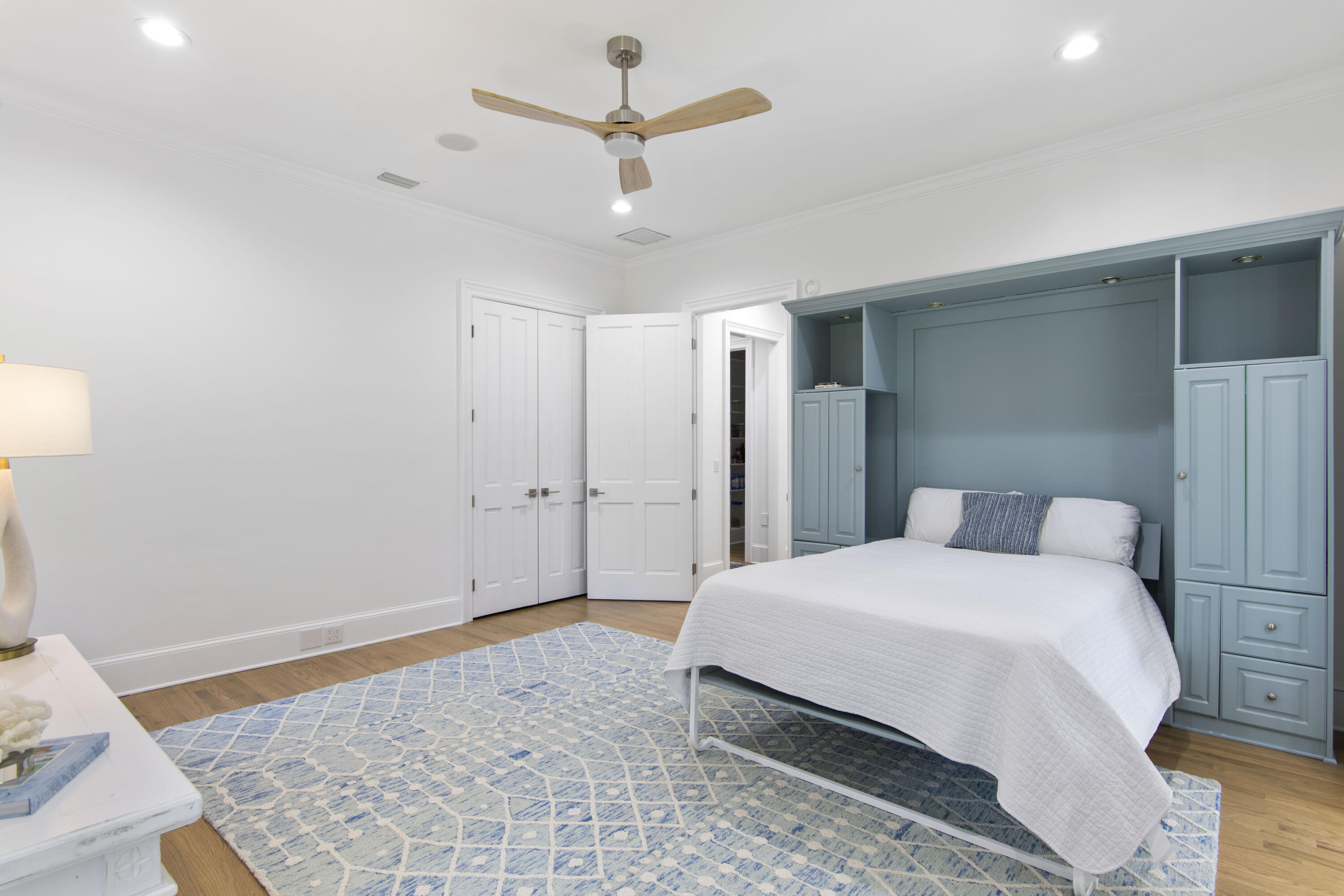 671 Driftwood Point Road Santa Rosa Beach, FL 32459 - Photo 30 of 41 a spacious bedroom with a bed and a rug