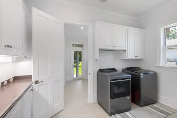 a kitchen with a stove and a sink