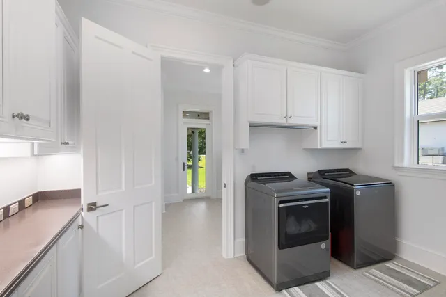 a kitchen with a stove and a sink