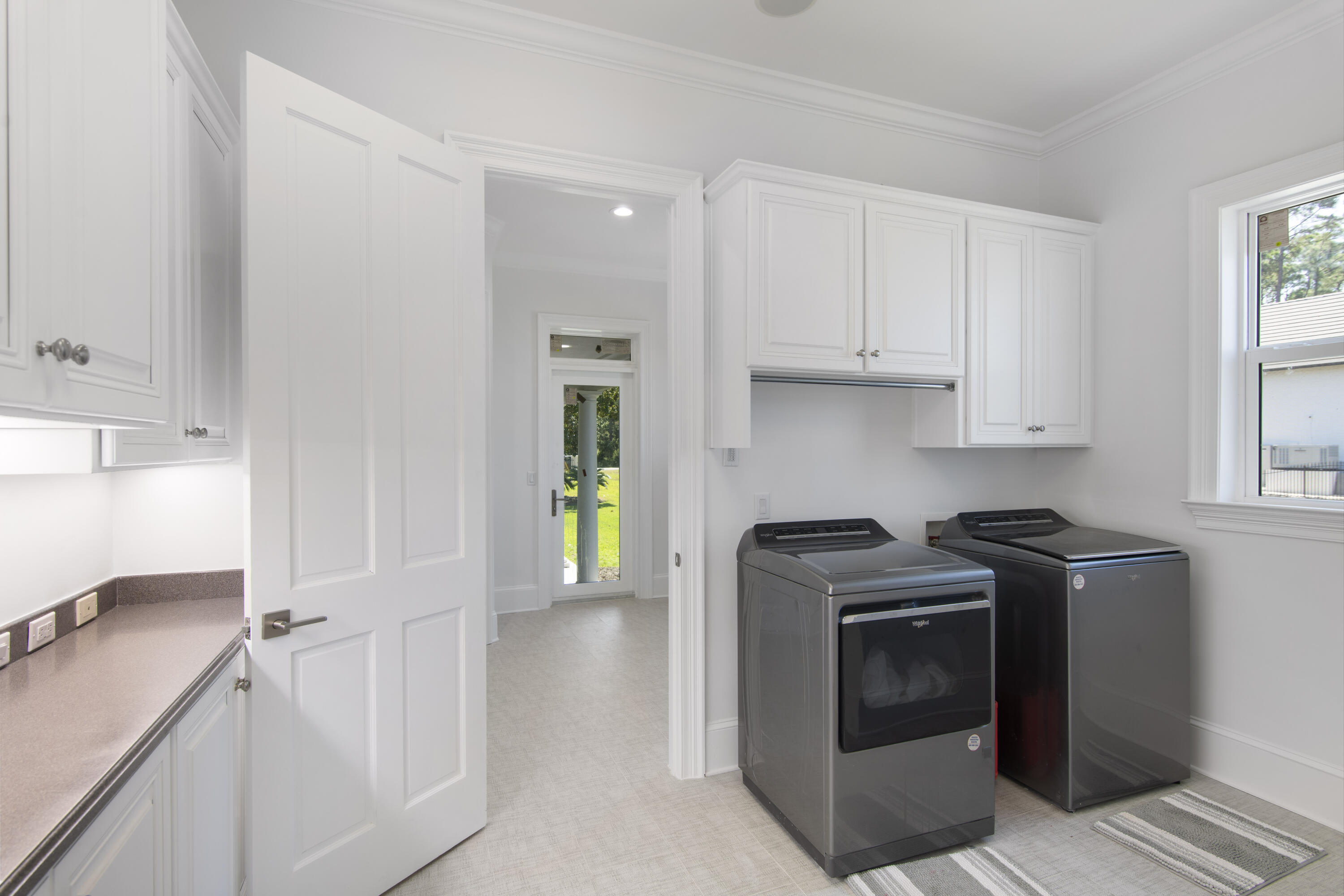 671 Driftwood Point Road Santa Rosa Beach, FL 32459 - Photo 37 of 41 a kitchen with a stove and a sink