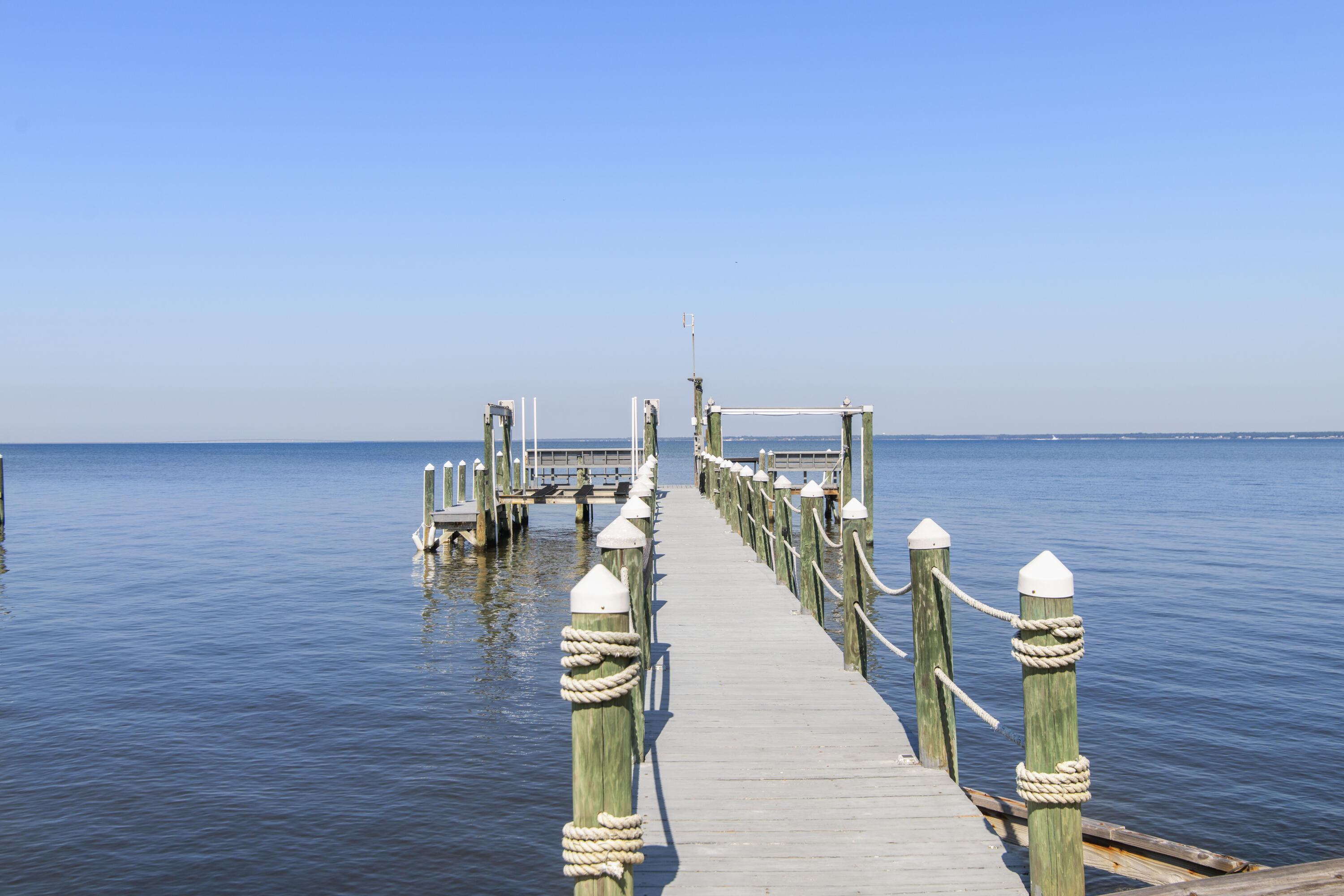671 Driftwood Point Road Santa Rosa Beach, FL 32459 - Photo 4 of 41 a view of a terrace with chairs