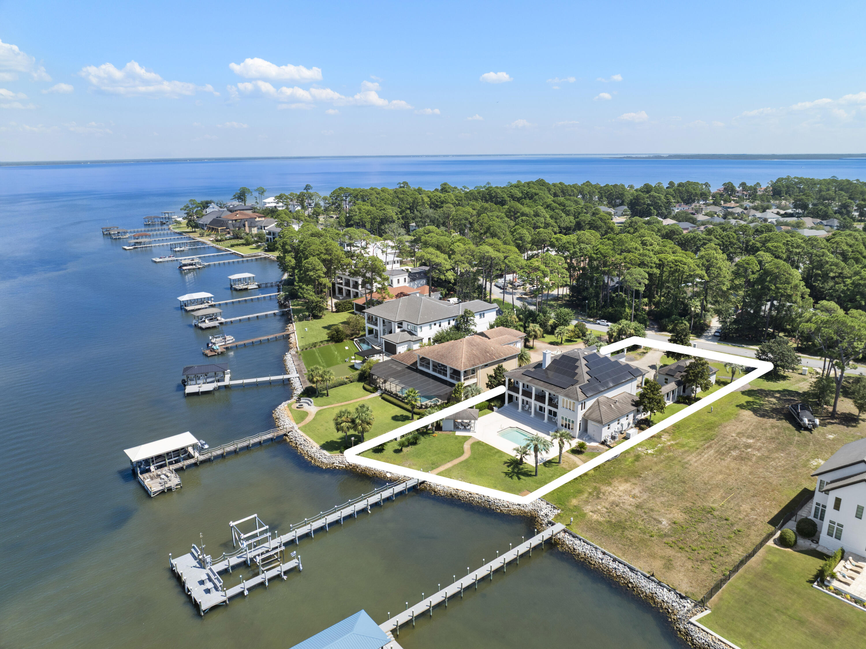 671 Driftwood Point Road Santa Rosa Beach, FL 32459 - Photo 5 of 41 an aerial view of a house with a swimming pool