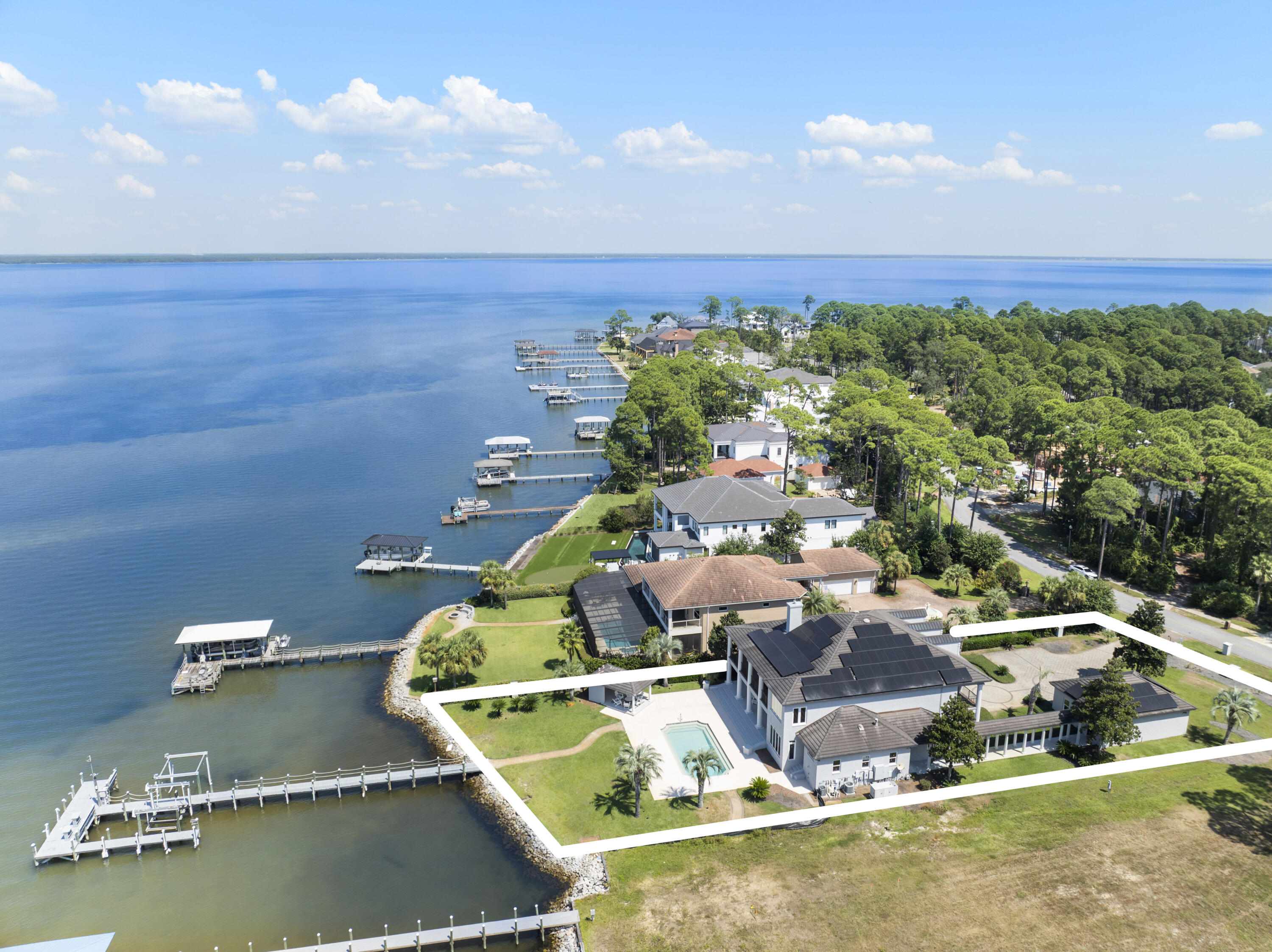 671 Driftwood Point Road Santa Rosa Beach, FL 32459 - Photo 6 of 41 an aerial view of a house with a yard