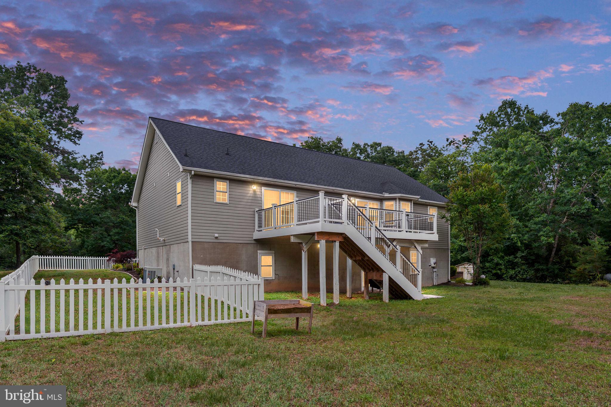 8009 Burrell Road Fredericksburg, VA 22407 - Photo 2 of 66 Charming home with serene sunset views.