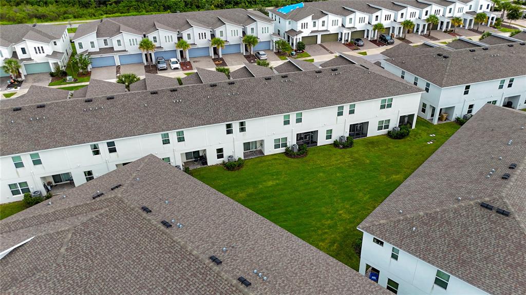 3510 Beau Road Kissimmee, FL 34746 - Photo 42 of 50 a aerial view of a house with a yard