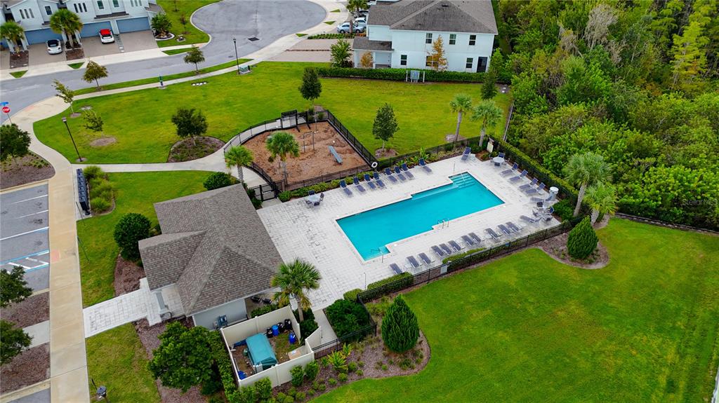 3510 Beau Road Kissimmee, FL 34746 - Photo 46 of 50 an aerial view of a house with a garden and swimming pool