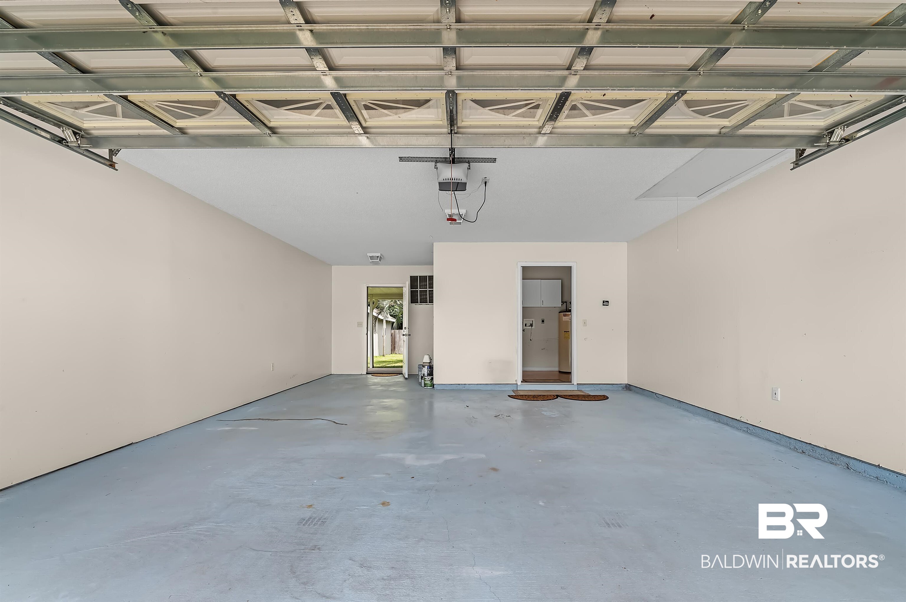 1502 Mulberry Lane Foley, AL 36535 - Photo 36 of 45 Garage with a garage door opener