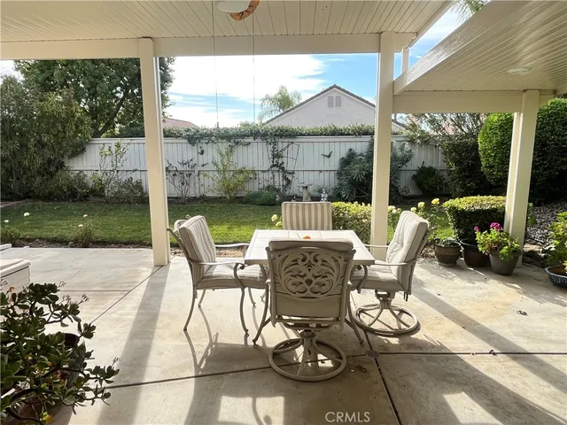 a view of a back yard of the house