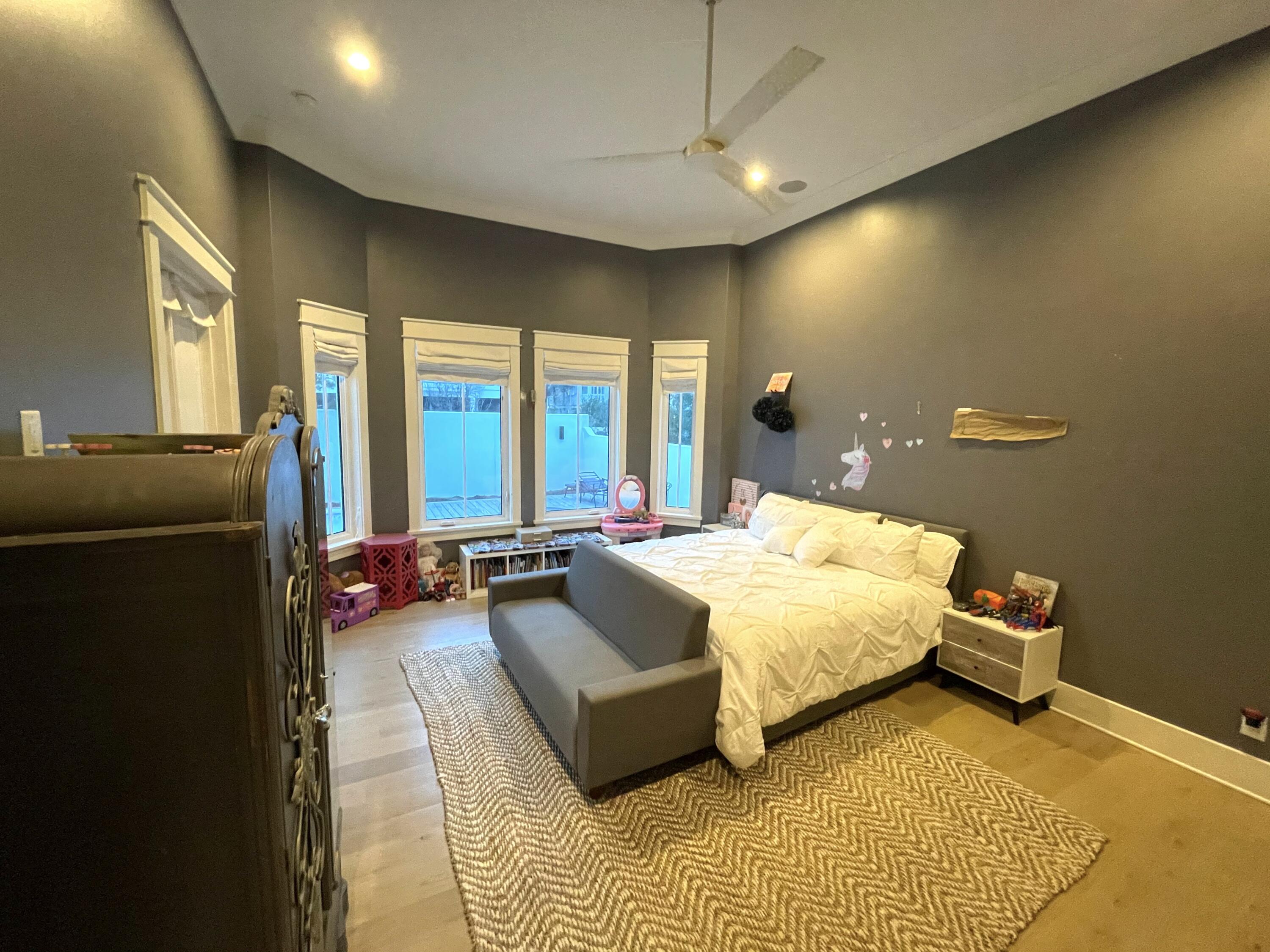 69 Brenda Lane Inlet Beach, FL 32461 - Photo 12 of 46 a bed room with a bed and a couch