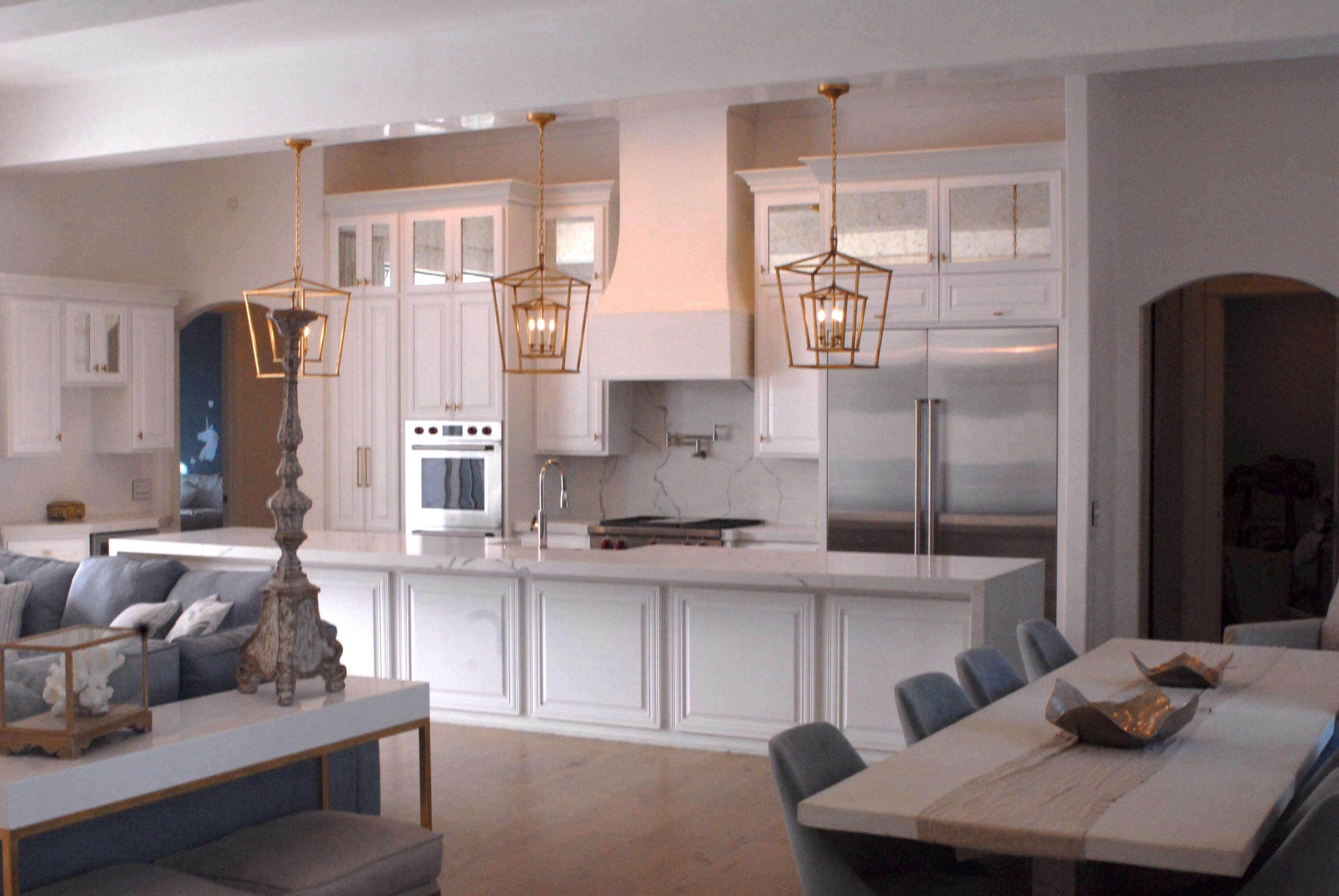 69 Brenda Lane Inlet Beach, FL 32461 - Photo 14 of 46 a kitchen with stainless steel appliances kitchen island granite countertop a table chairs in it and wooden floors