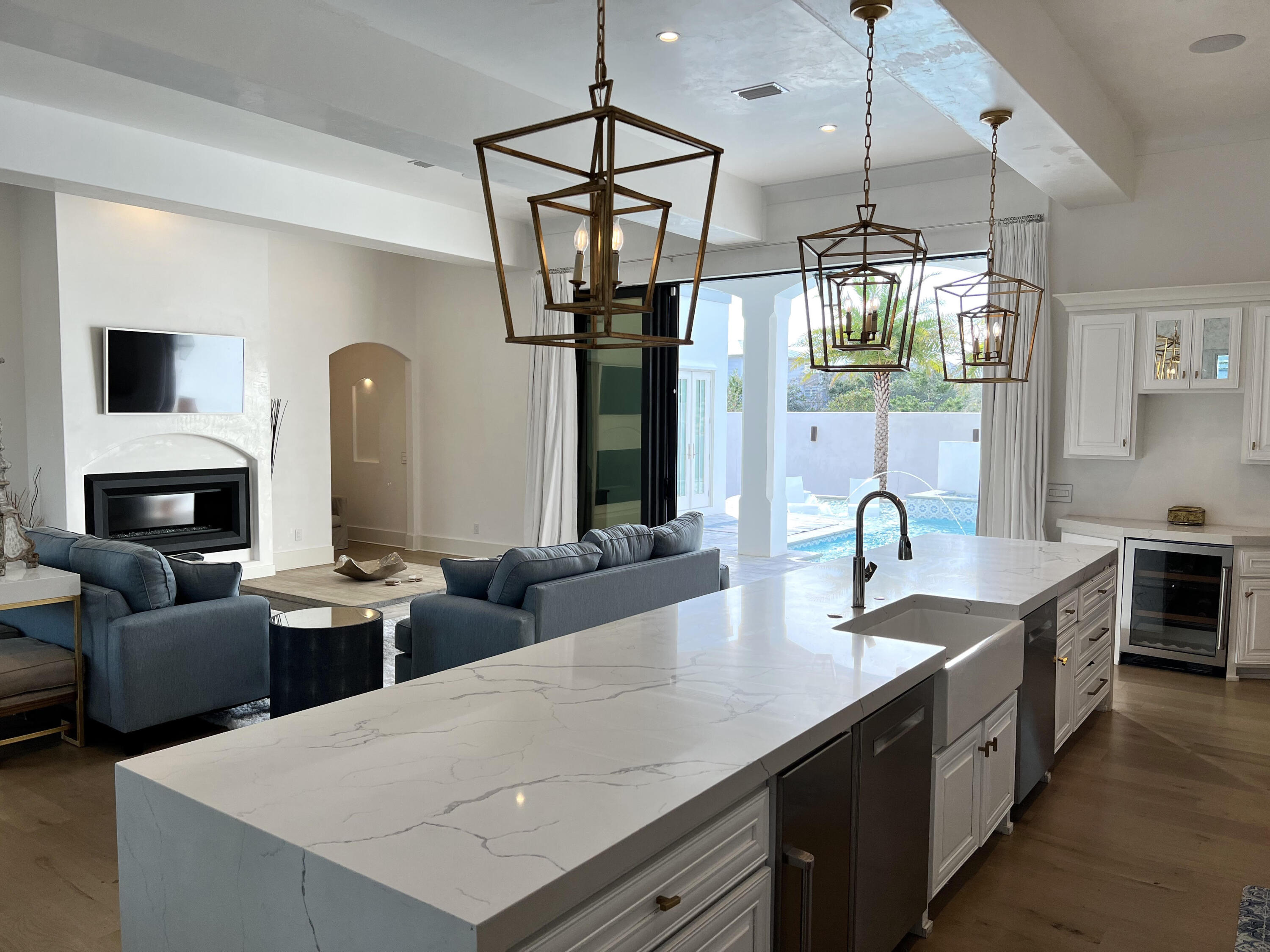 69 Brenda Lane Inlet Beach, FL 32461 - Photo 16 of 46 a living room with fireplace furniture and a chandelier