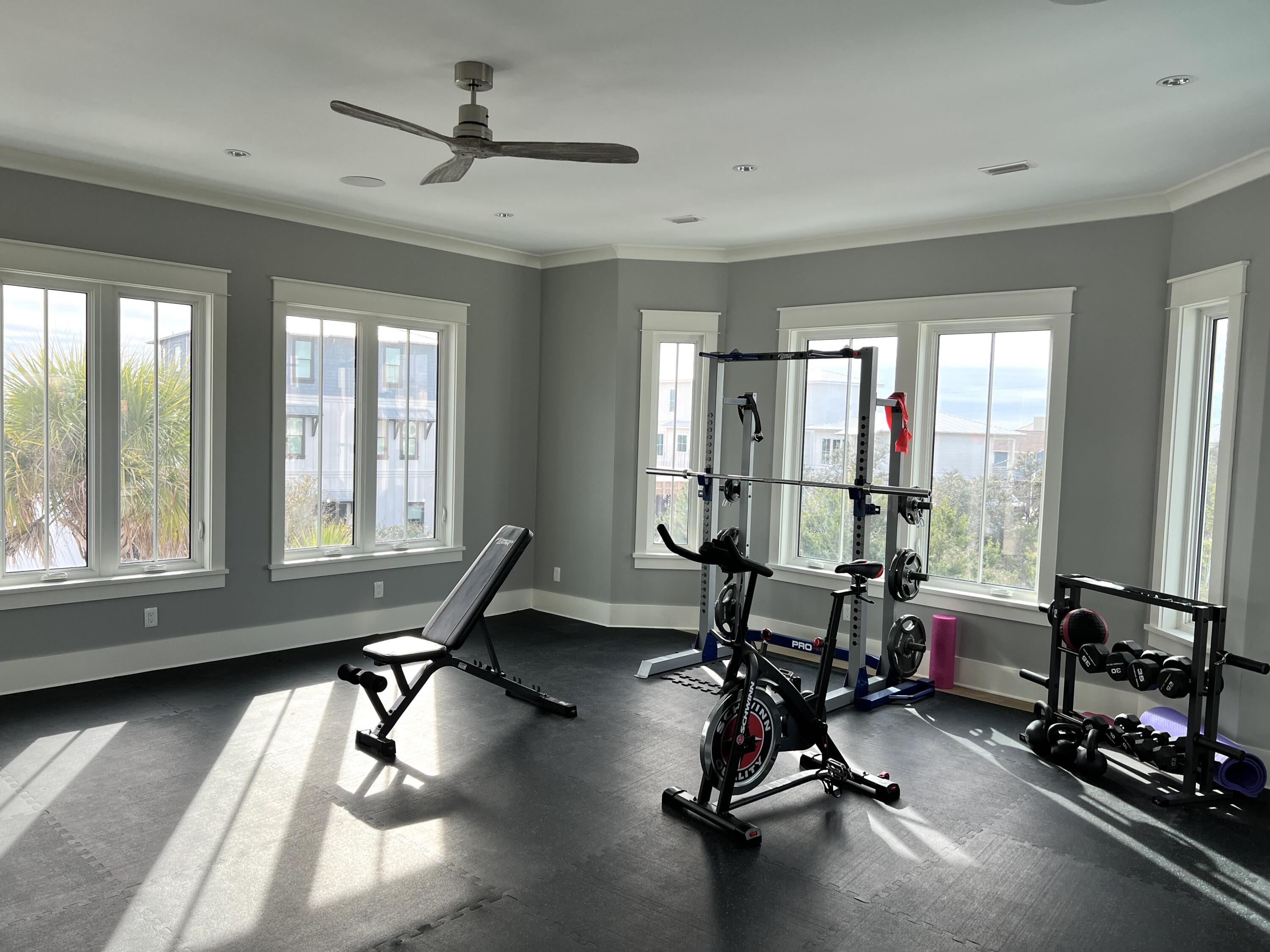 69 Brenda Lane Inlet Beach, FL 32461 - Photo 20 of 46 a room with gym equipment and windows