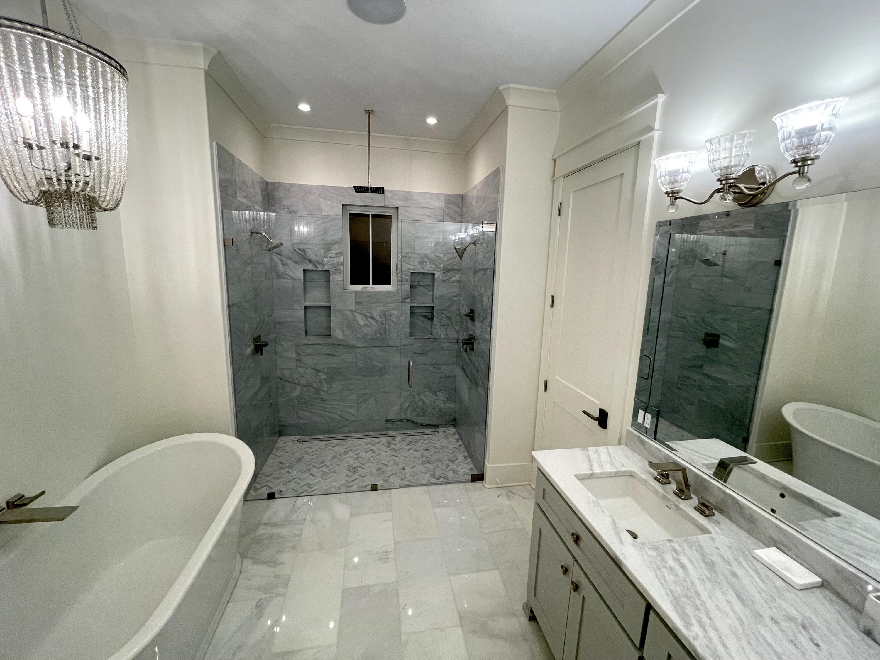 69 Brenda Lane Inlet Beach, FL 32461 - Photo 27 of 46 a bathroom with a granite countertop sink a toilet and shower