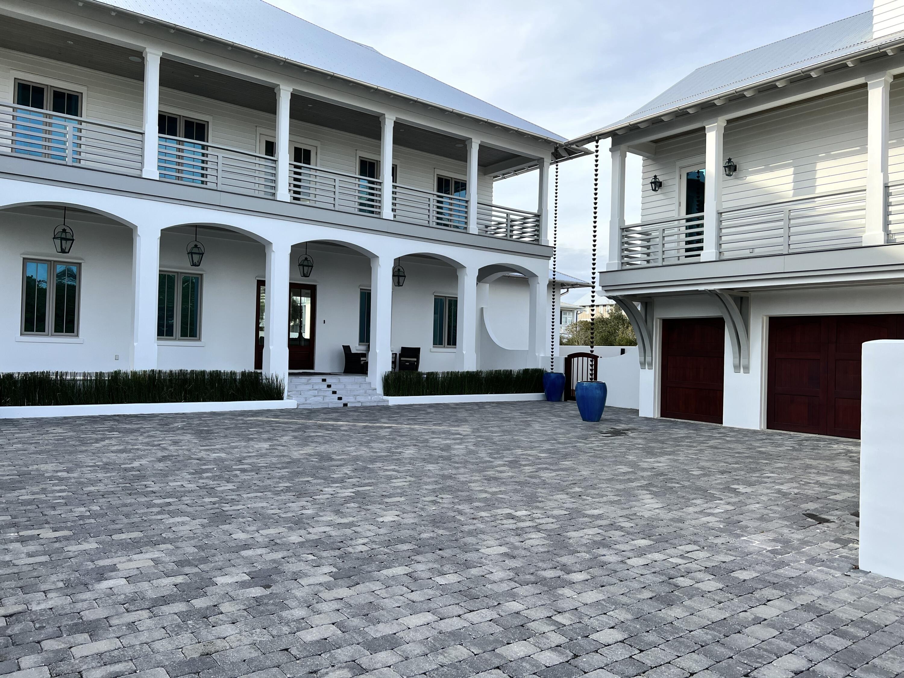 69 Brenda Lane Inlet Beach, FL 32461 - Photo 3 of 46 a front view of a house with a yard