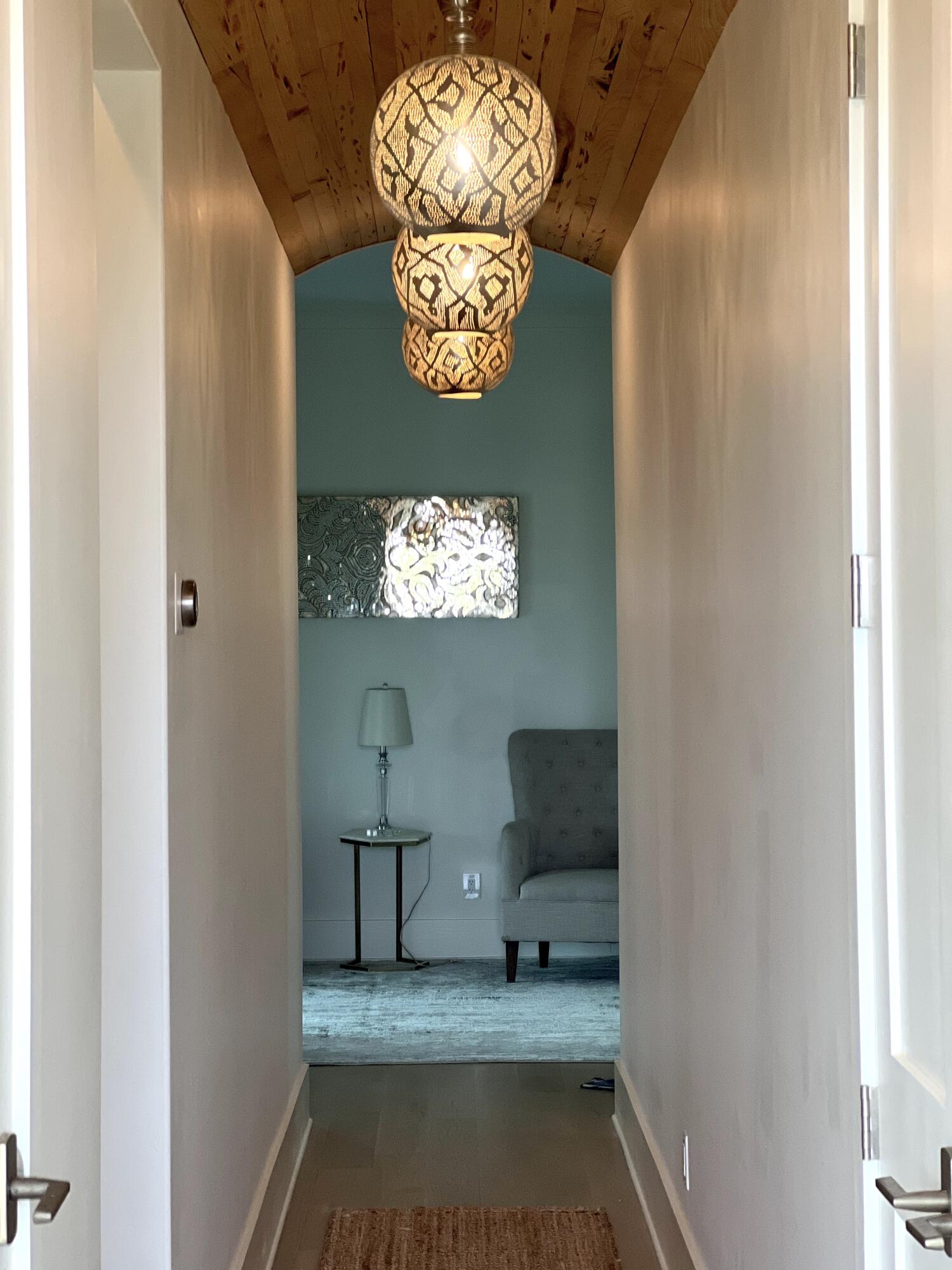 69 Brenda Lane Inlet Beach, FL 32461 - Photo 31 of 46 a view of a hallway with entryway door wooden floor and a dining room
