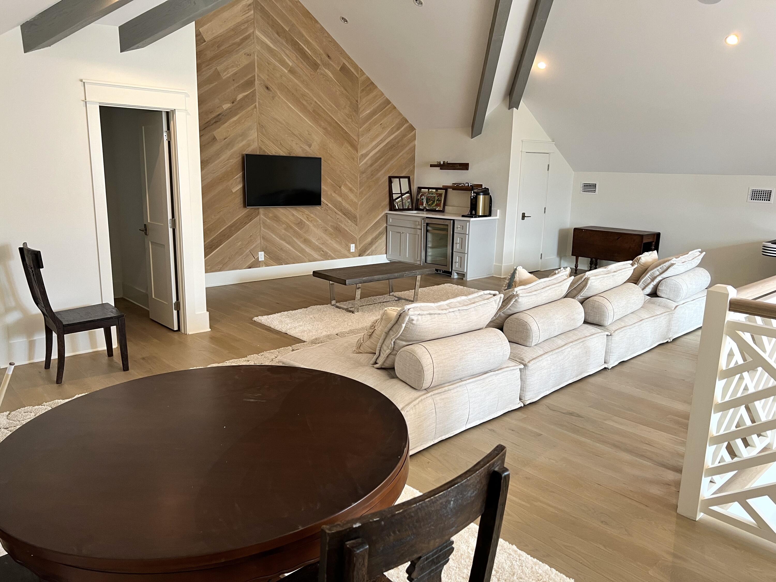 69 Brenda Lane Inlet Beach, FL 32461 - Photo 32 of 46 a living room with furniture and a flat screen tv