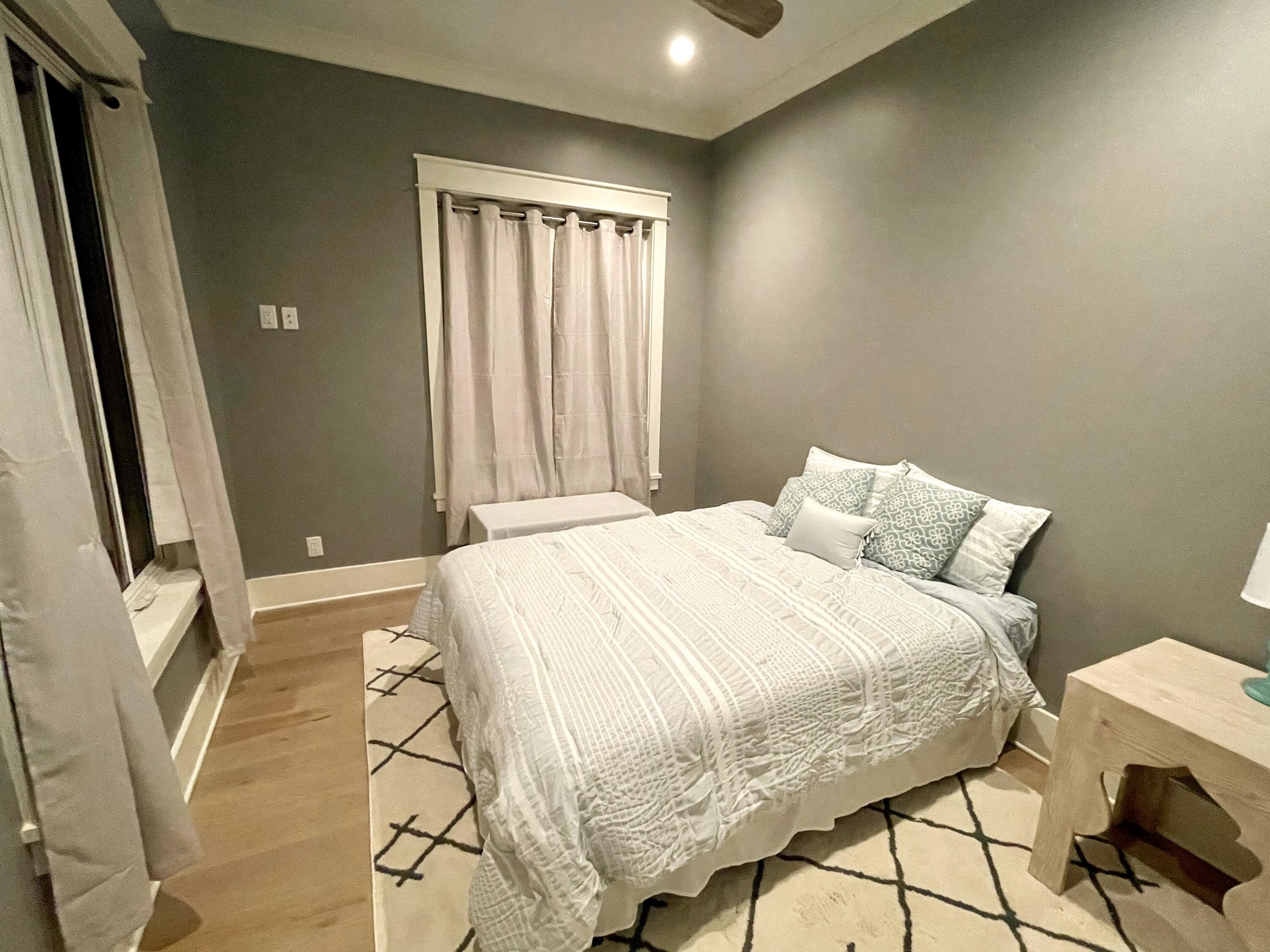 69 Brenda Lane Inlet Beach, FL 32461 - Photo 39 of 46 a large bed sitting in a bedroom next to a window