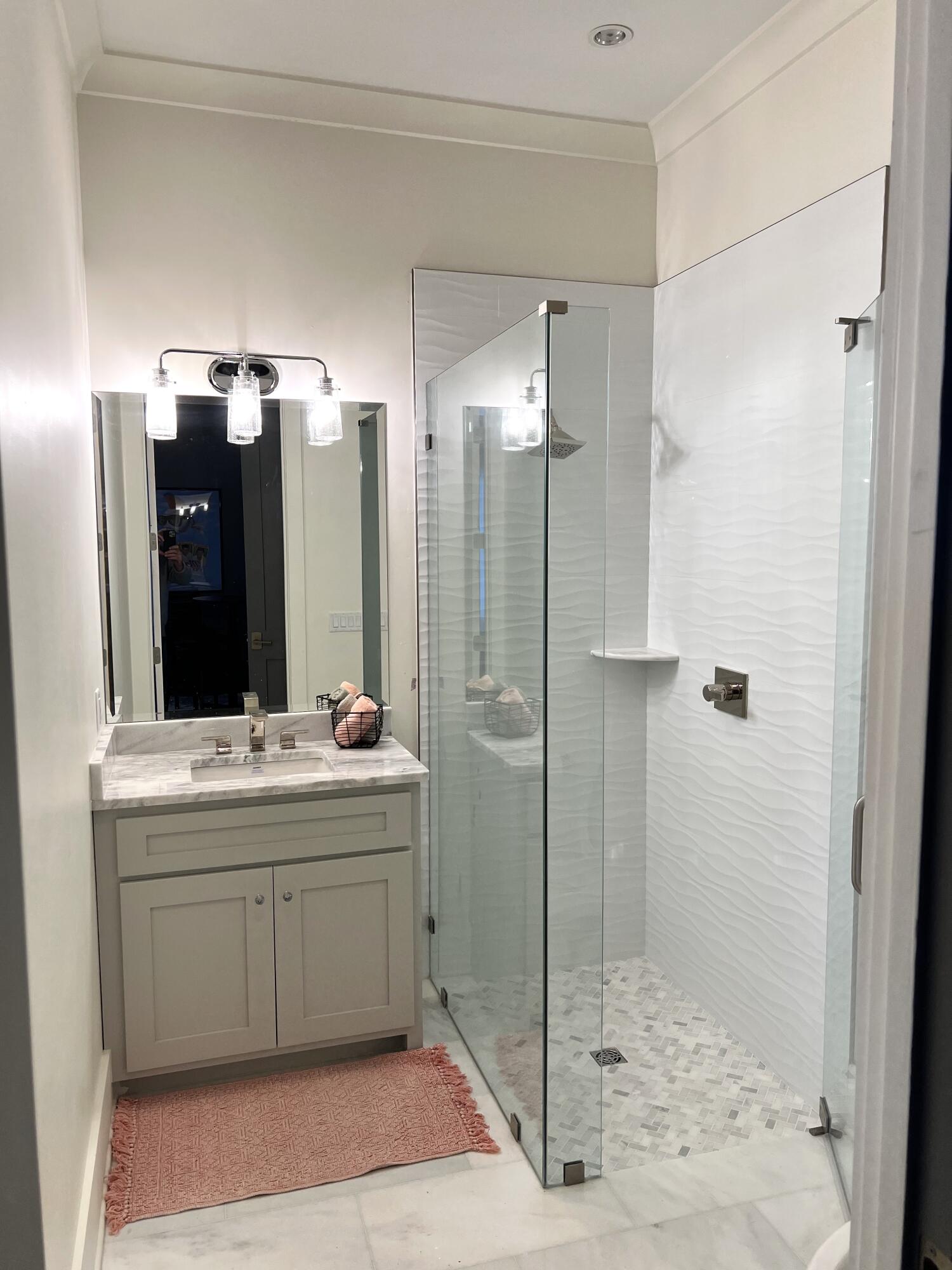 69 Brenda Lane Inlet Beach, FL 32461 - Photo 41 of 46 a bathroom with a double vanity sink mirror and shower