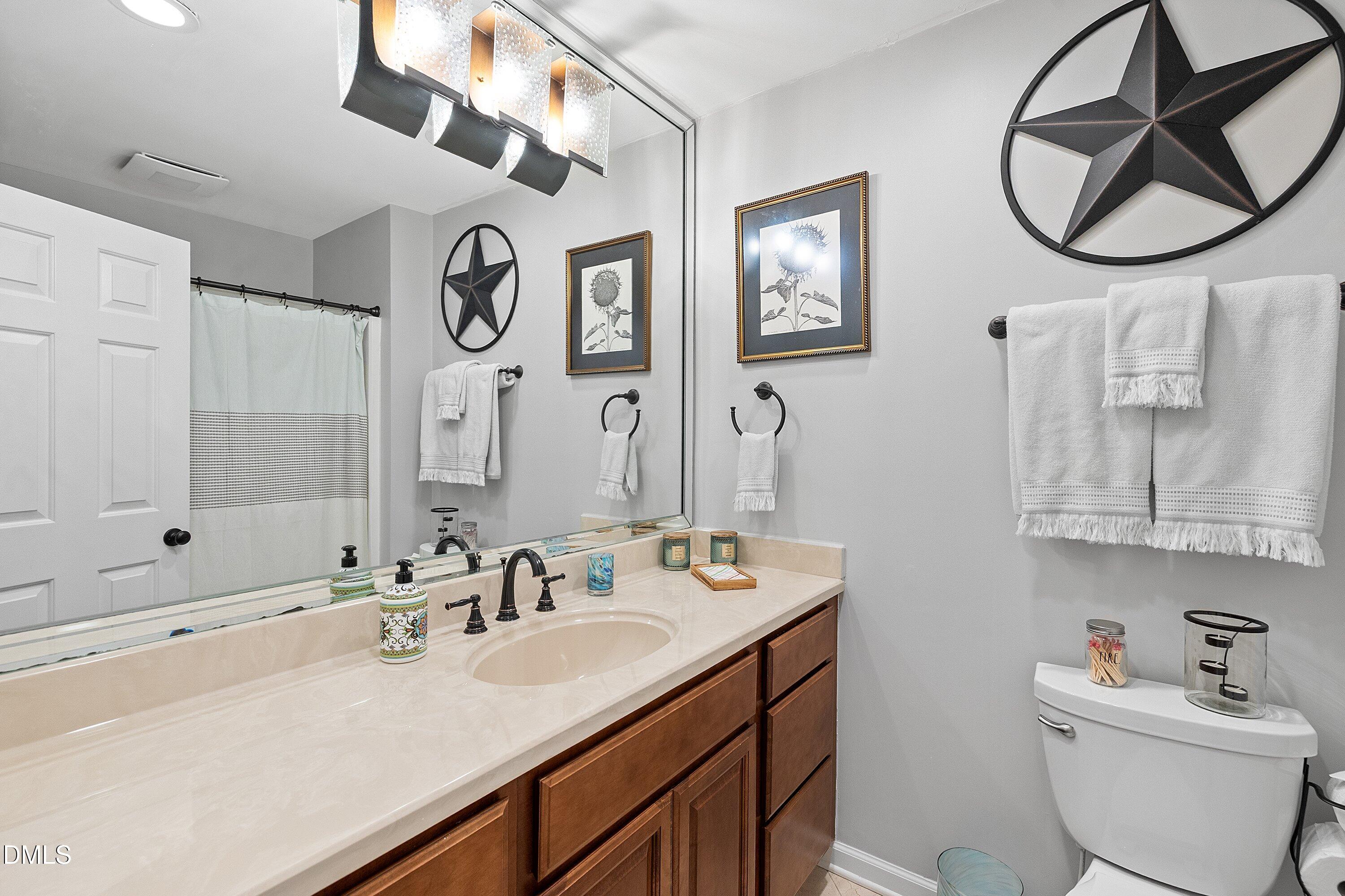6540 Wynbrook Way Raleigh, NC 27612 - Photo 27 of 47 Guest bathroom with shower/tub.