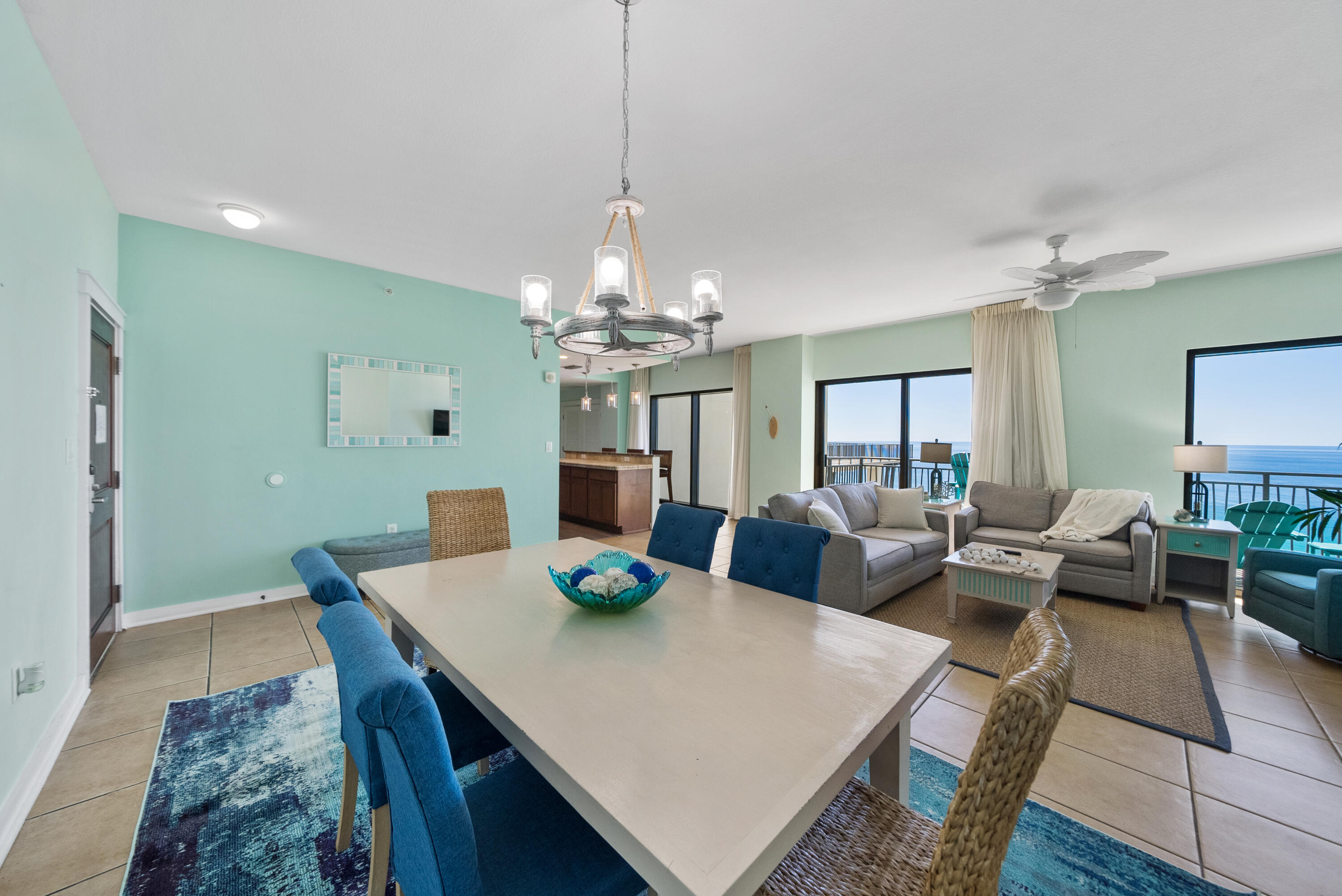 15100 Front Beach Road, Unit 1604 Panama City Beach, FL 32413 - Photo 12 of 66 a view of a dining room with furniture