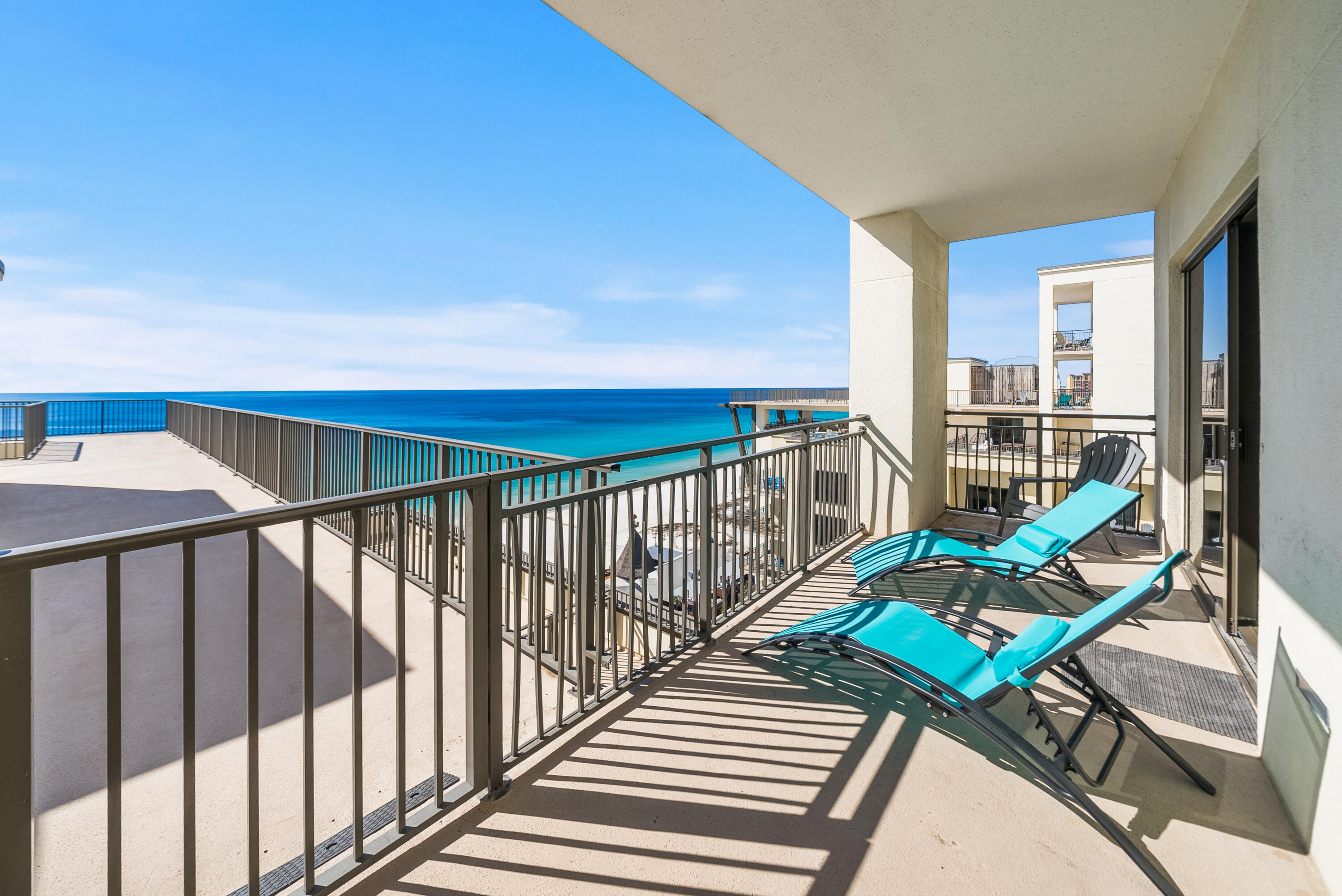 15100 Front Beach Road, Unit 1604 Panama City Beach, FL 32413 - Photo 38 of 66 a view of a balcony with chairs