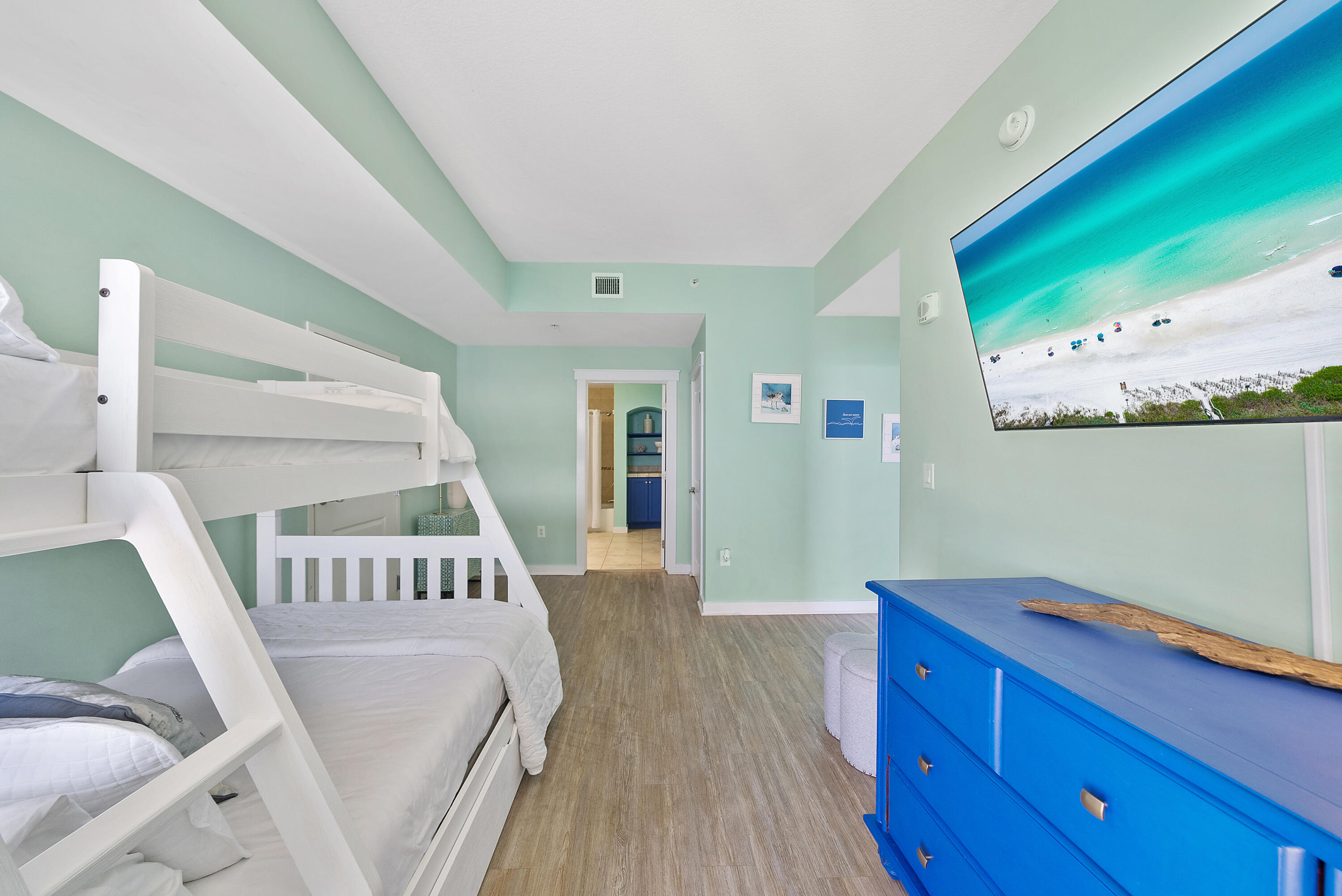 15100 Front Beach Road, Unit 1604 Panama City Beach, FL 32413 - Photo 39 of 66 a living room with furniture and a wooden floor