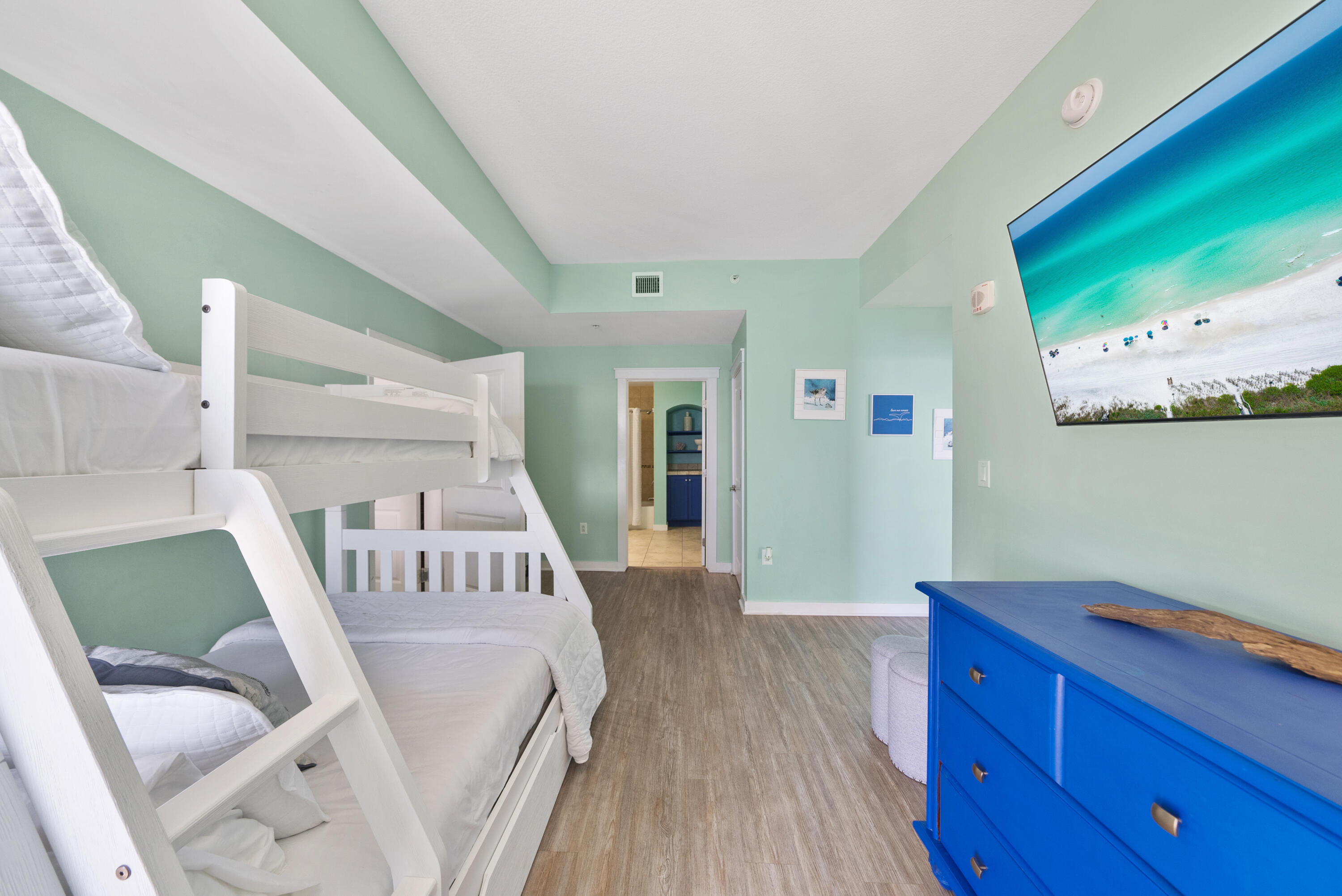 15100 Front Beach Road, Unit 1604 Panama City Beach, FL 32413 - Photo 43 of 66 a living room with furniture and a wooden floor