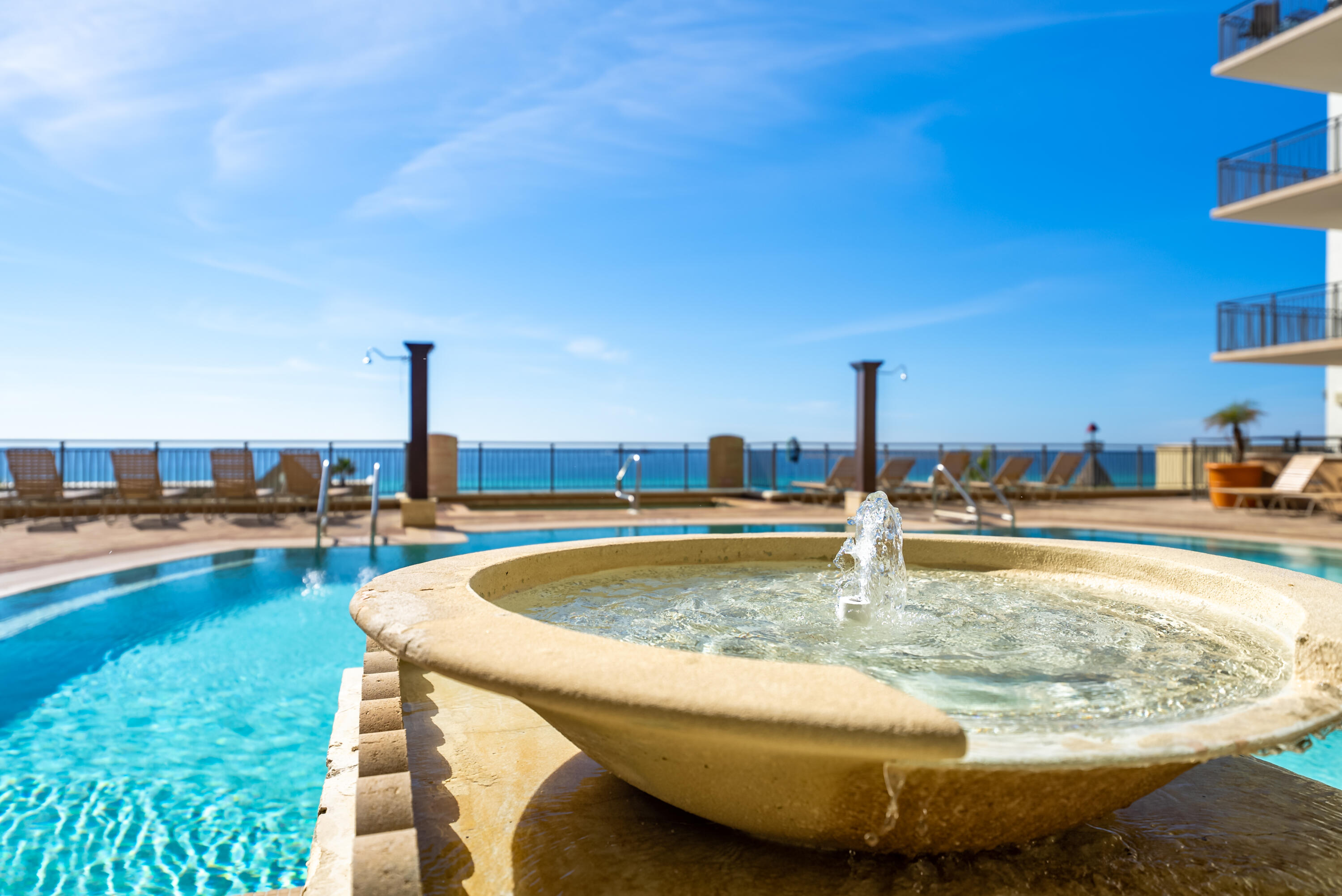 15100 Front Beach Road, Unit 1604 Panama City Beach, FL 32413 - Photo 5 of 66 a view of a swimming pool with outdoor seating