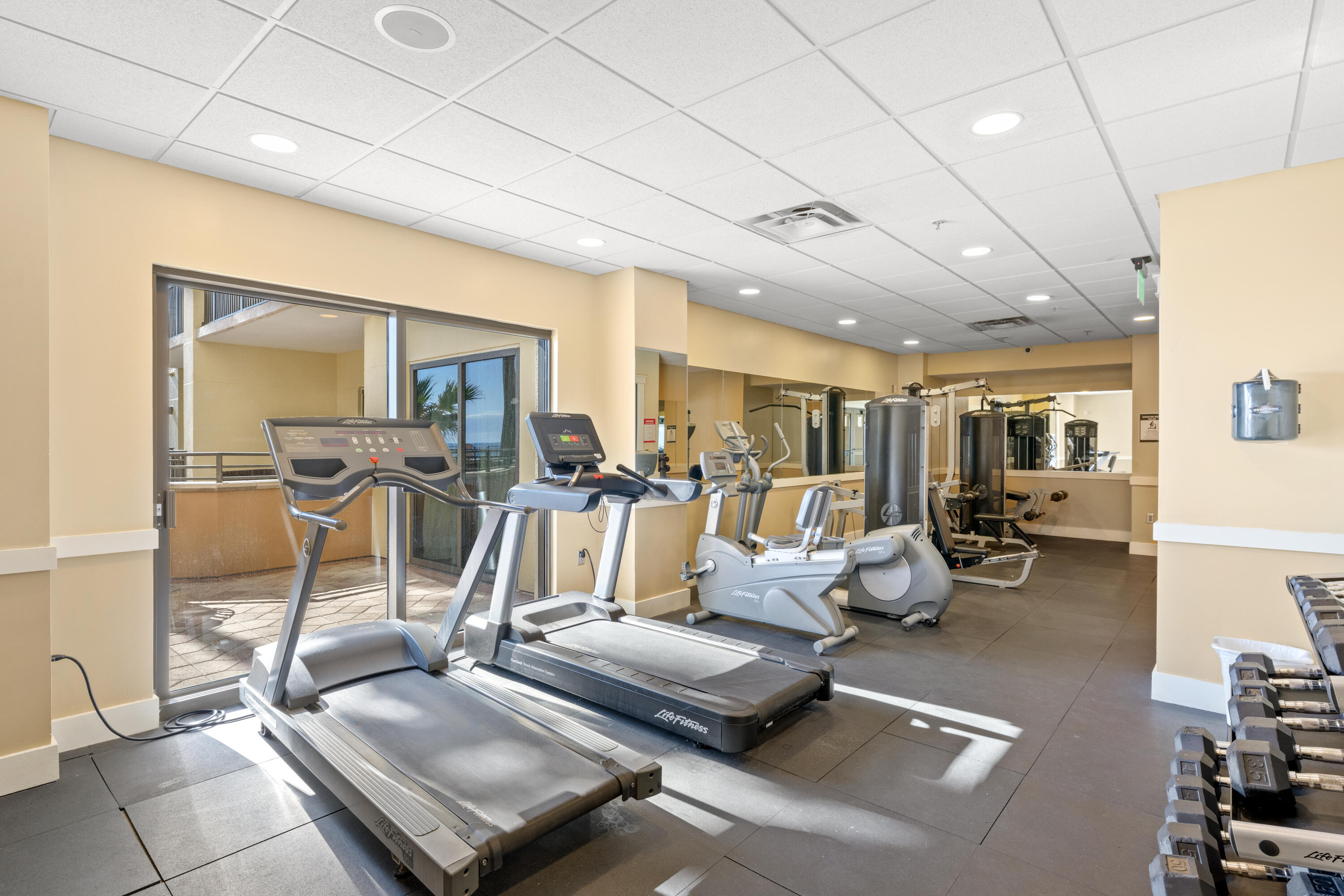 15100 Front Beach Road, Unit 1604 Panama City Beach, FL 32413 - Photo 56 of 66 a view of a room with gym equipment