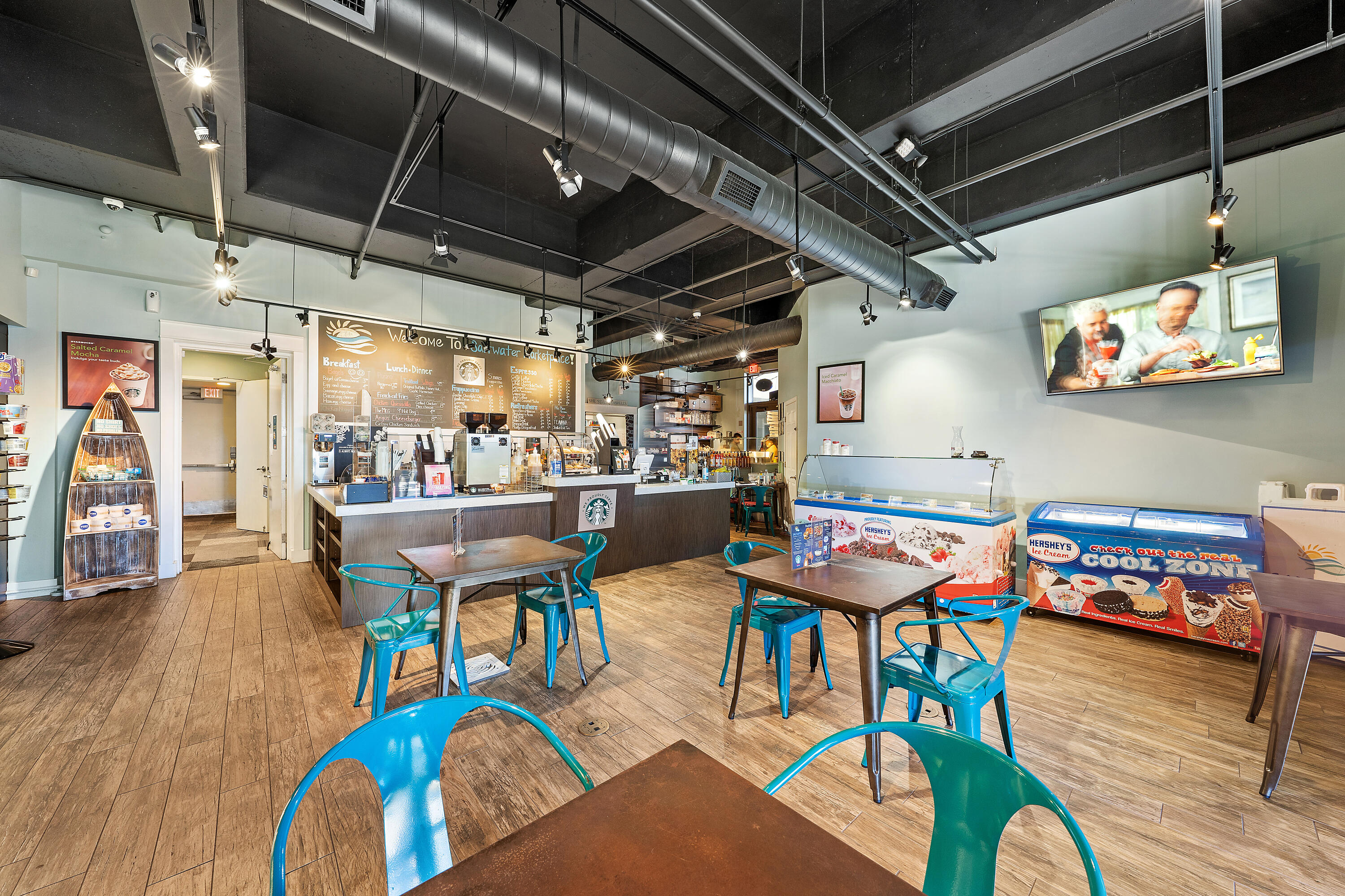 15100 Front Beach Road, Unit 1604 Panama City Beach, FL 32413 - Photo 63 of 66 a outdoor dining space with furniture and wooden floor