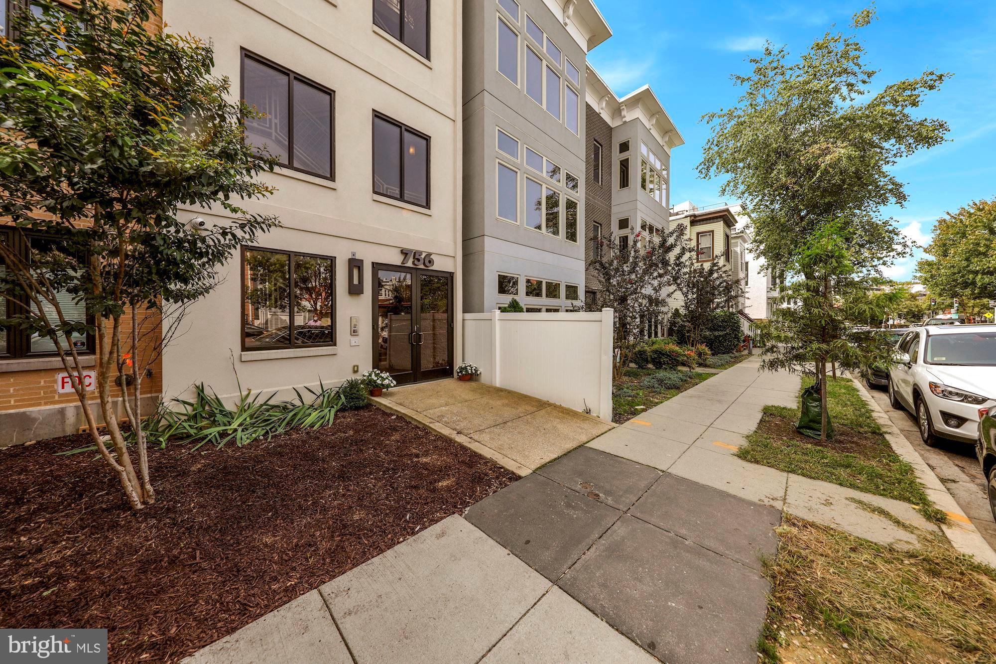 756 Park Road Northwest, Unit 2 Washington, DC 20010 - Photo 2 of 48 a view of a street with cars on road