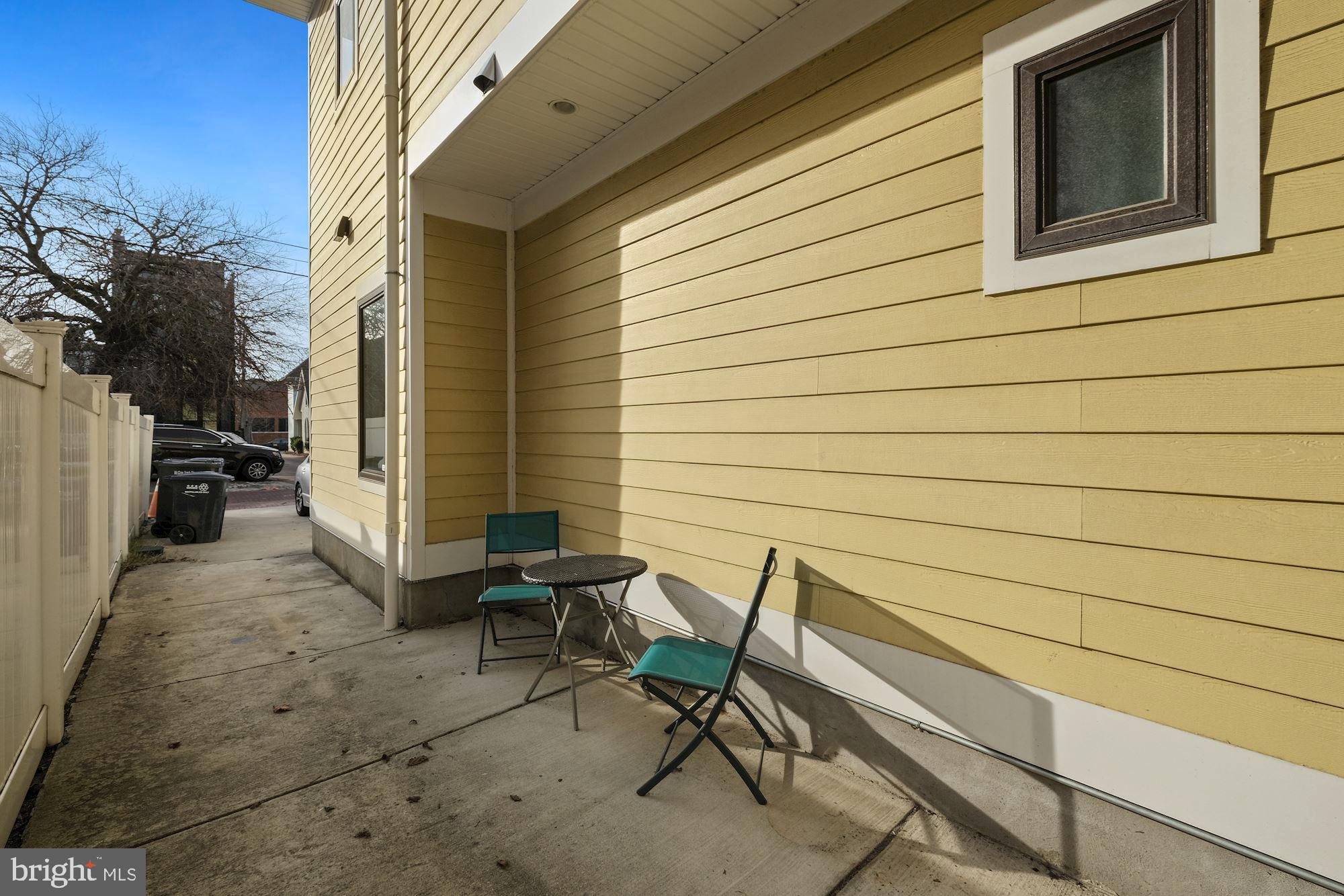 756 Park Road Northwest, Unit 2 Washington, DC 20010 - Photo 25 of 48 a view of a house with backyard and sitting area