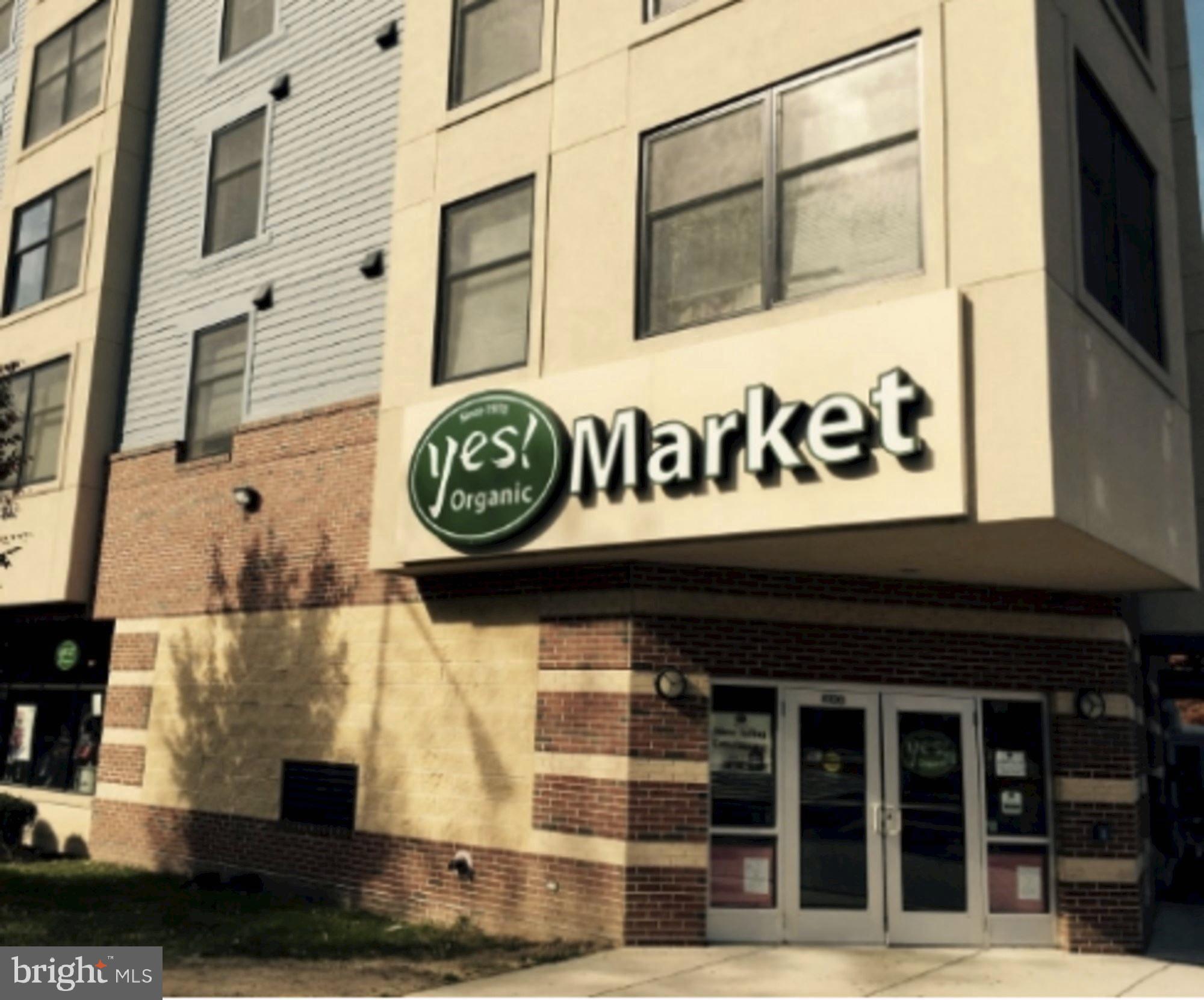 756 Park Road Northwest, Unit 2 Washington, DC 20010 - Photo 32 of 48 a sign on a pole on a street