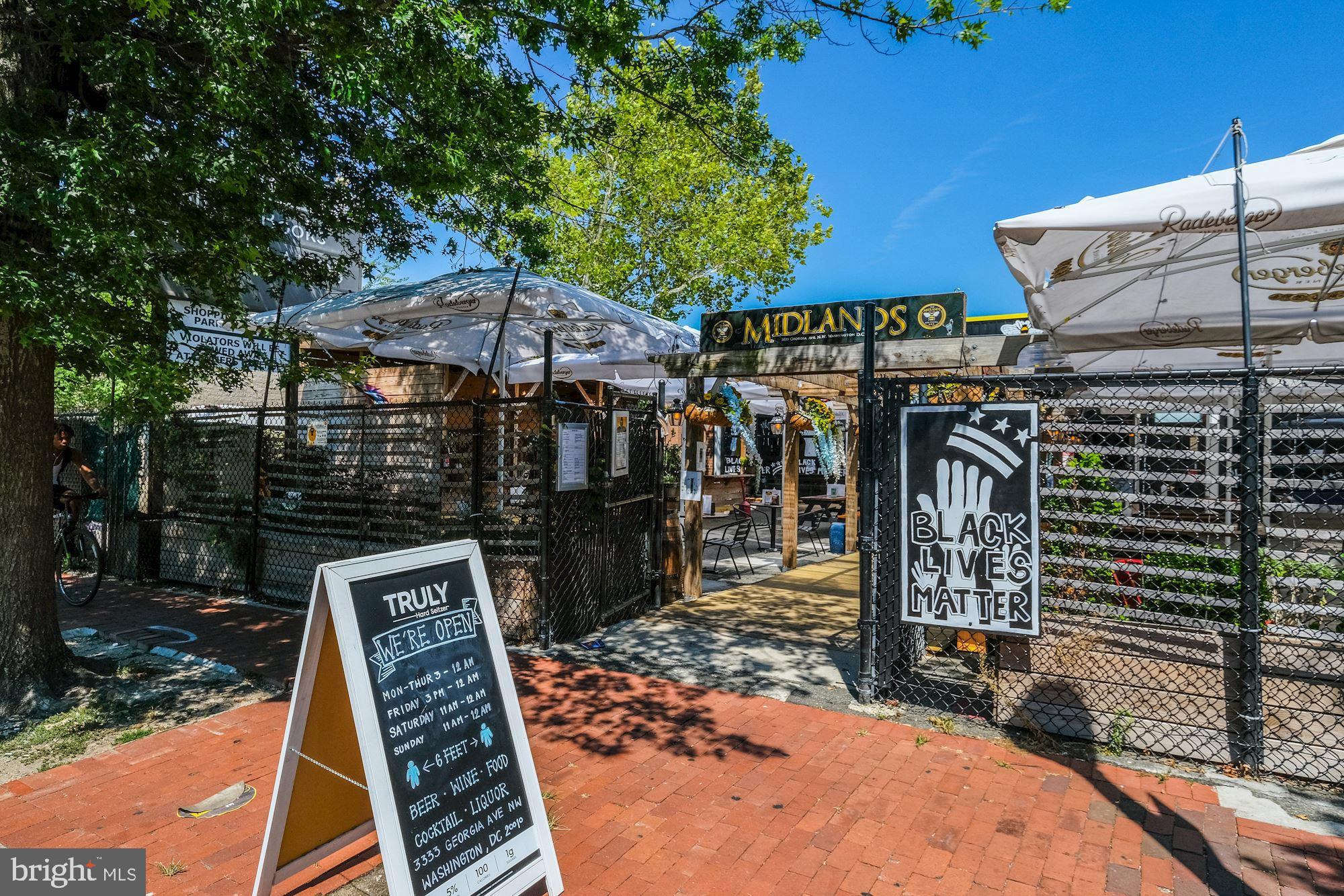 756 Park Road Northwest, Unit 2 Washington, DC 20010 - Photo 36 of 48 a view of a patio with wooden fence