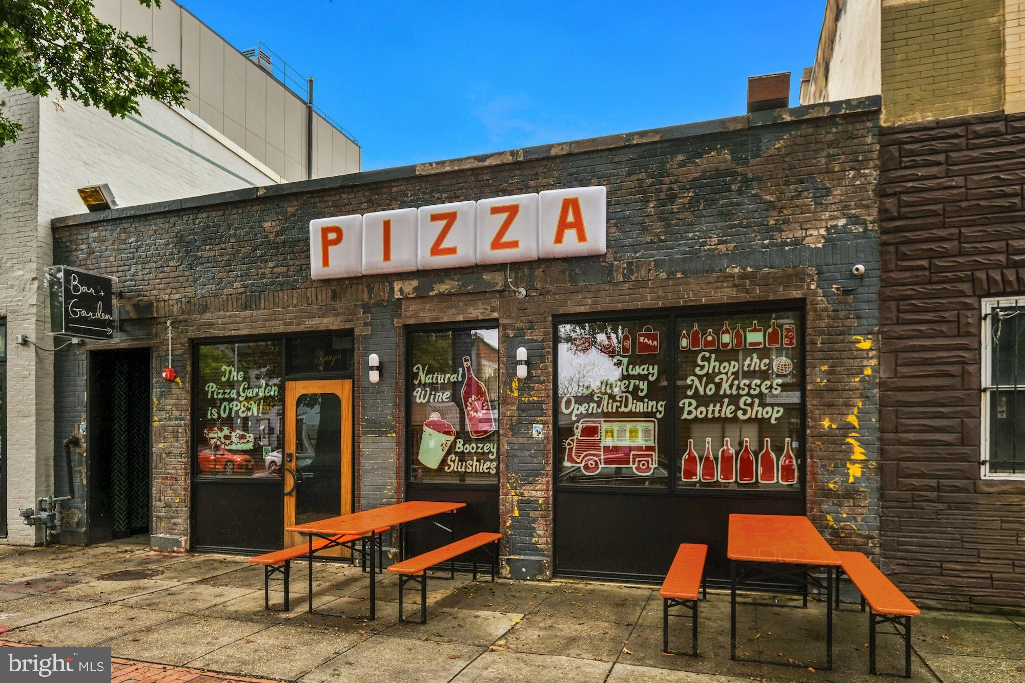 756 Park Road Northwest, Unit 2 Washington, DC 20010 - Photo 37 of 48 a outdoor living area with a table and chairs