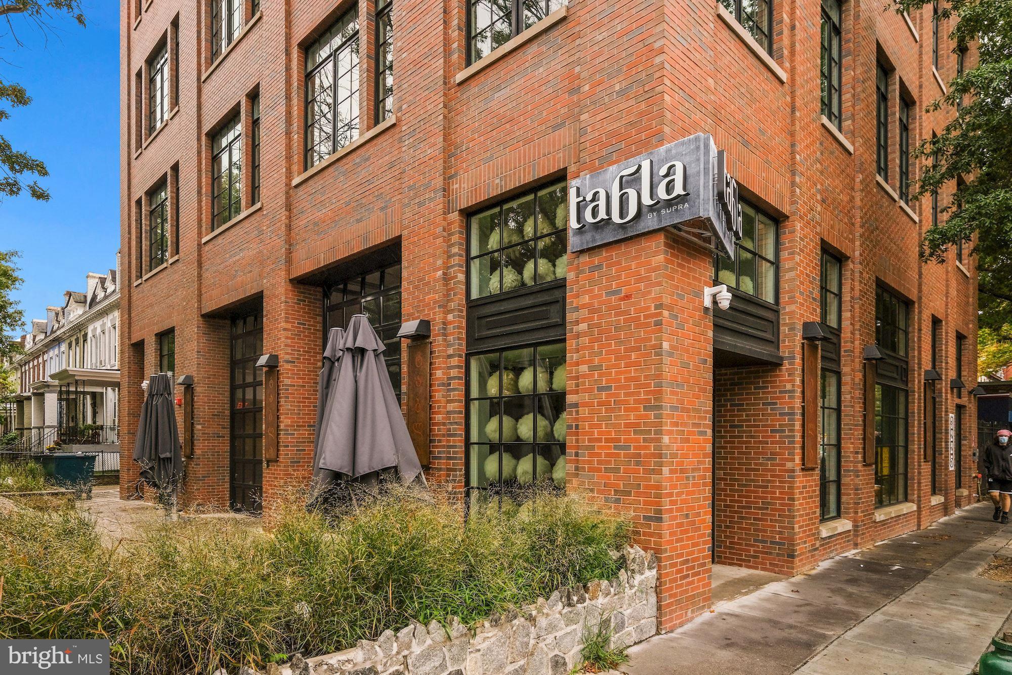 756 Park Road Northwest, Unit 2 Washington, DC 20010 - Photo 38 of 48 a view of a pathway along the building