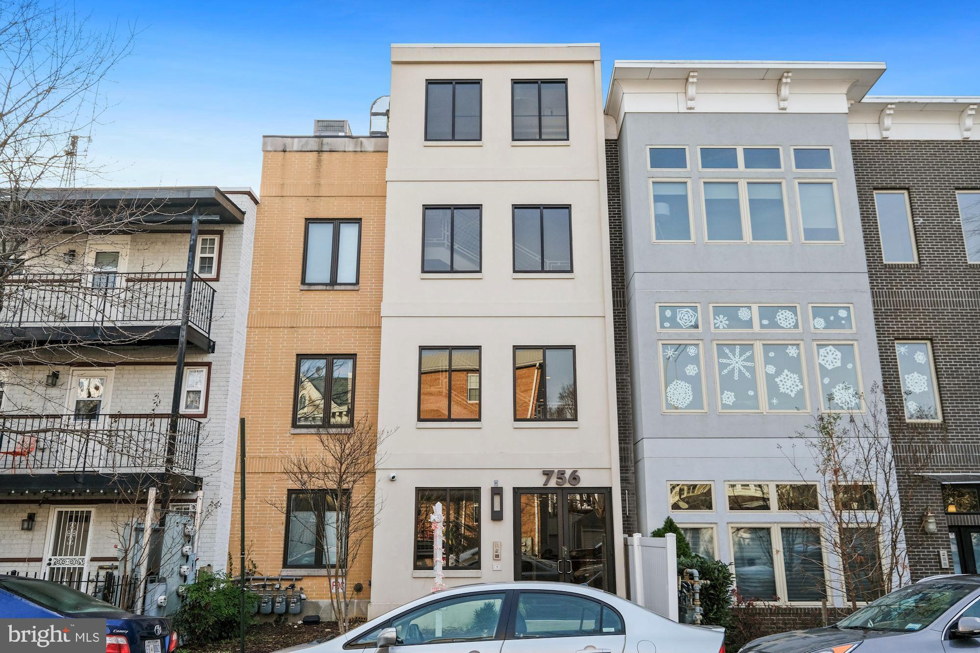 756 Park Road Northwest, Unit 2 Washington, DC 20010 - Photo 47 of 48 a front view of a building with glass windows