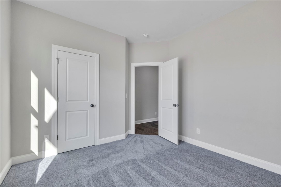 2009 Aberdeen Lane Walhalla, SC 29691 - Photo 15 of 43 This spacious bedroom offers ample natural light and a clean, versatile design.